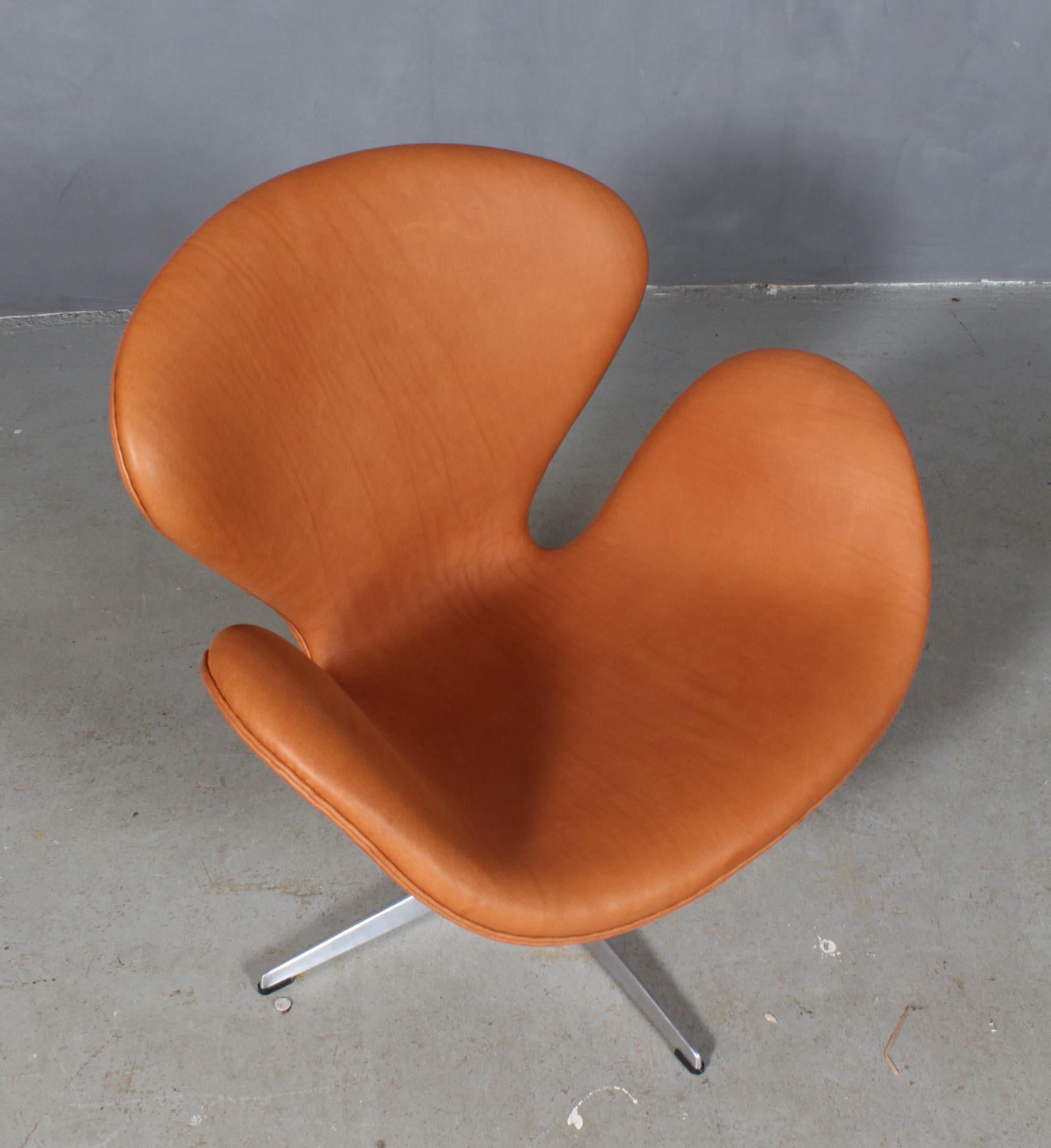 The swan chair, new upholstered in cognac aniline leather. 

Made by Fritz Hansen.

New upholstered.


This iconic chair is one of the most famous chairs in the world and is recognized by design lovers in all countries. It is the classical