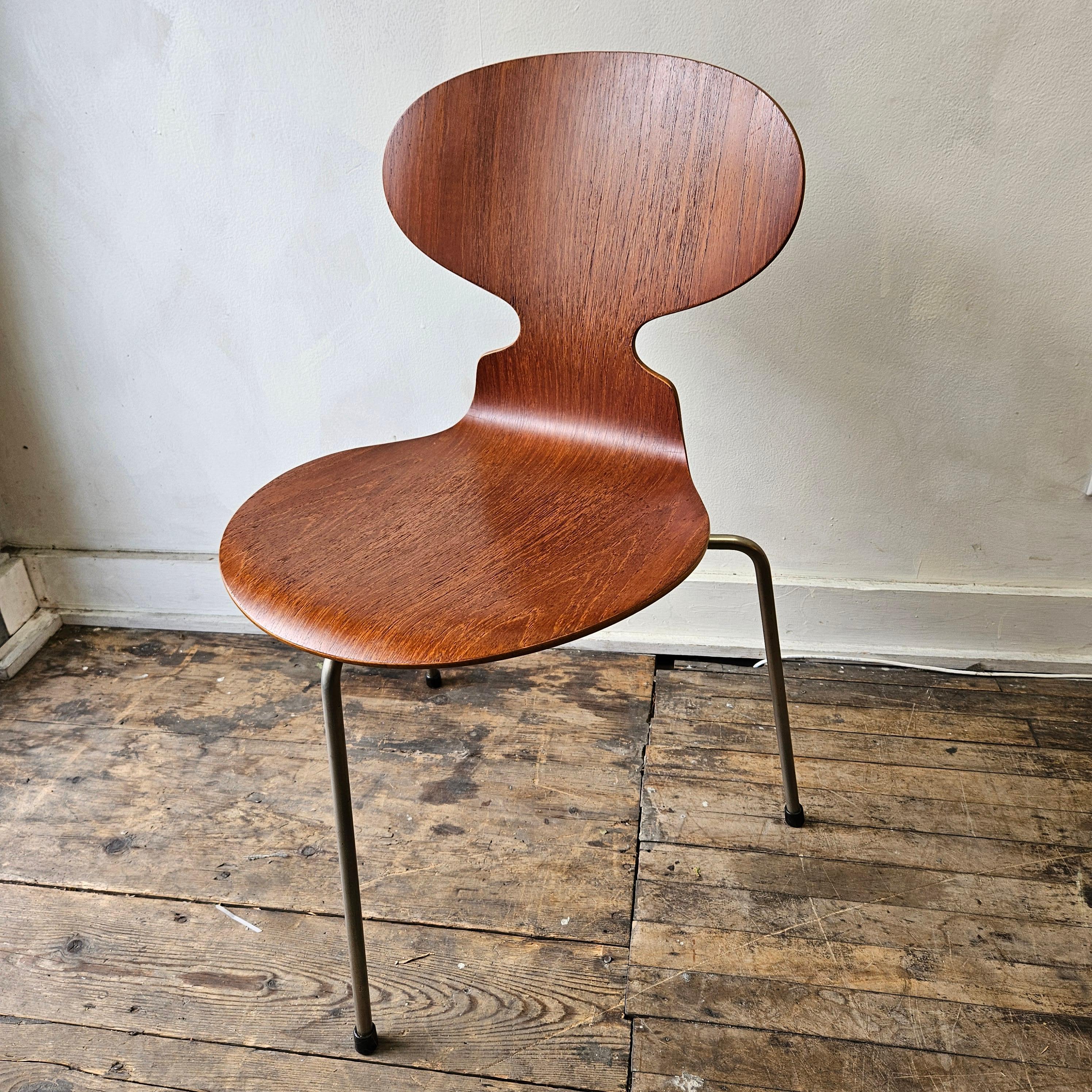 Iconic Ant chair designed by Arne Jacobsen for Fritz Hansen in the 1950s. The Ant chair is a true design classic. This one is extra special because it is a first edition. This version of model 3101 is made of teak and has a chrome base.