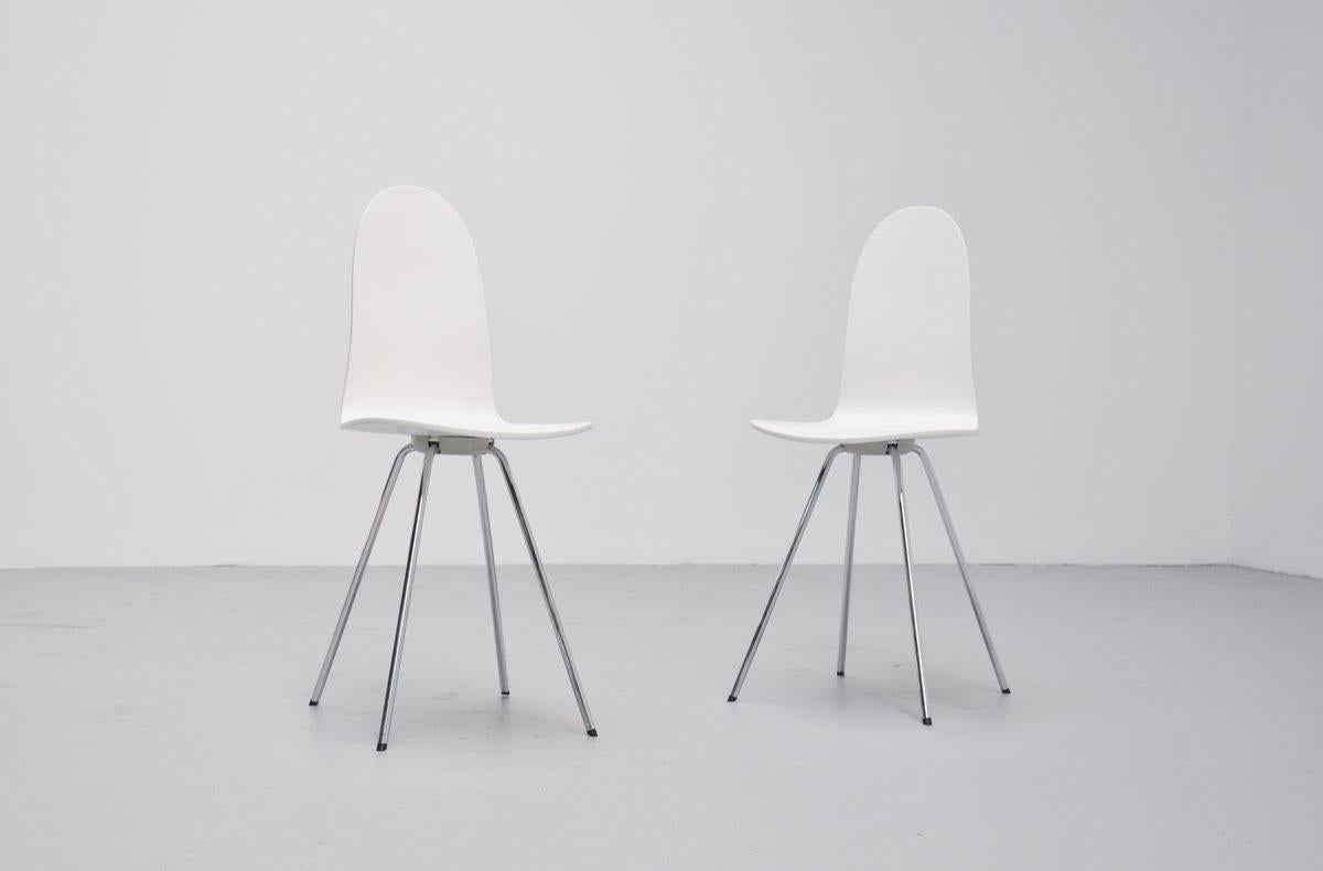 Rare tongue chairs designed by Arne Jacobsen for Fritz Hansen, Denmark, 1970s. These chairs have chrome plated legs and white lacquered plywood seats. Very nice slim shaped chairs in good condition. Marked with the Fritz Hansen cap underneath the