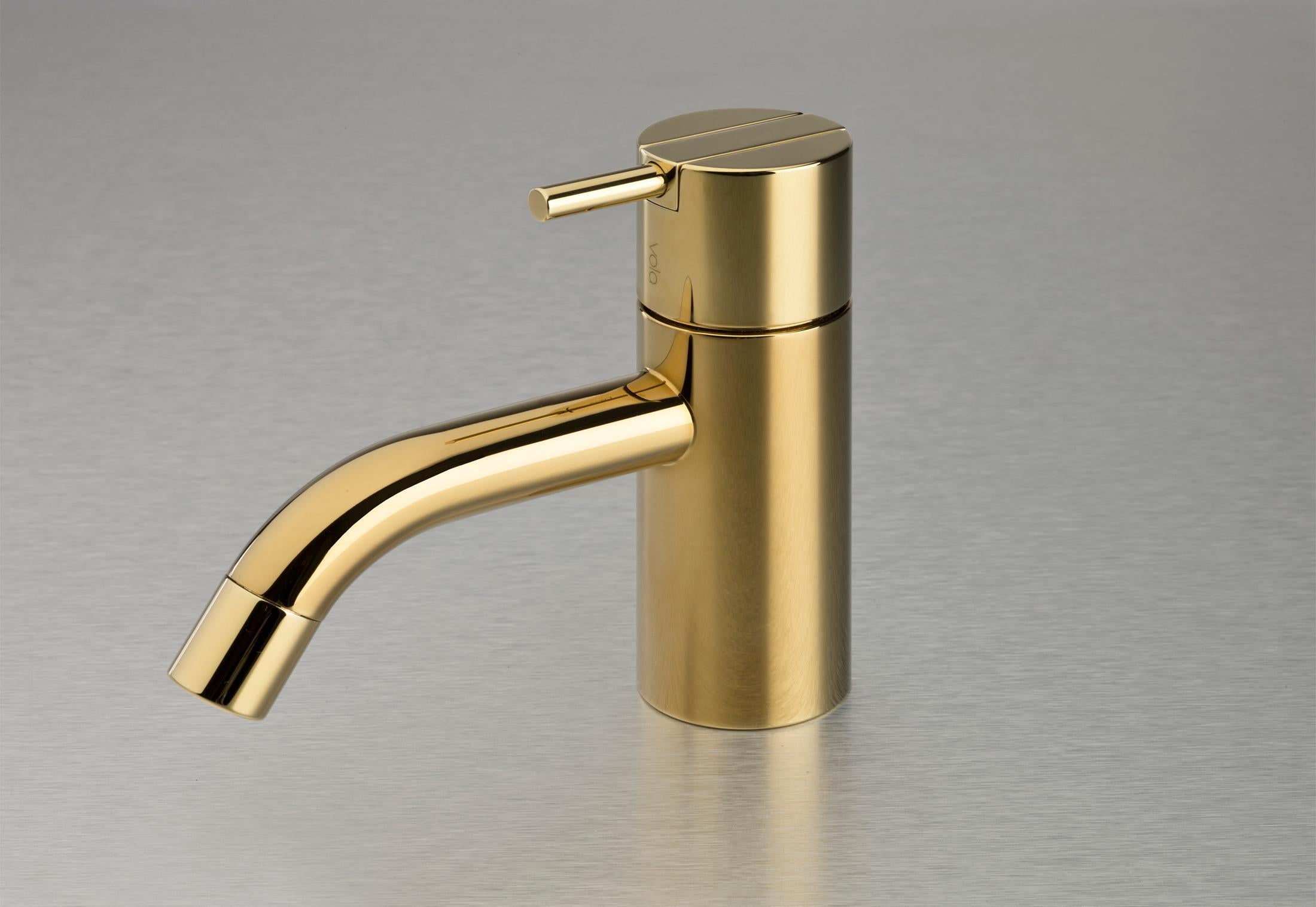Arne Jacobsen Vola basin Faucet, natural brass, HV1-19 -03 minimal bath fixture. In box. Never installed. MSRP of the HV1-19 (Natural Brass) is approximately 1300 USD. Iconic mid-century design and a triumph of Scandinavian modernism. Natural Brass