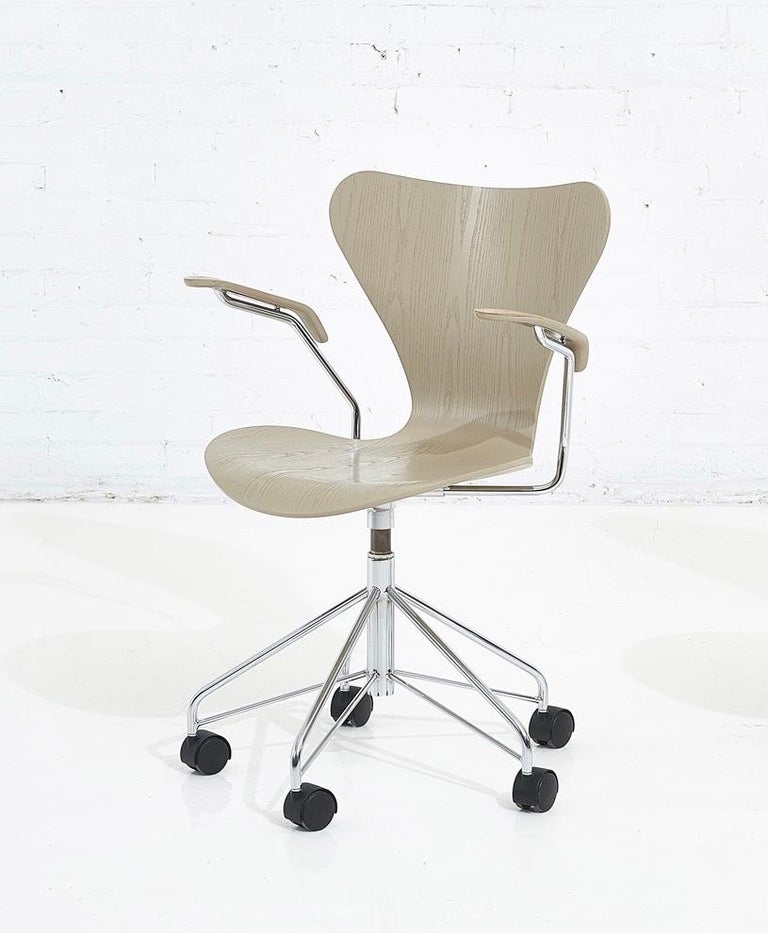 Rolling “Ant” desk chair by Arne Jacobsen for Fritz Hansen.  Made in Denmark.  Vintage 1980’s production.  2nd chair w/o arms is available in separate listing.