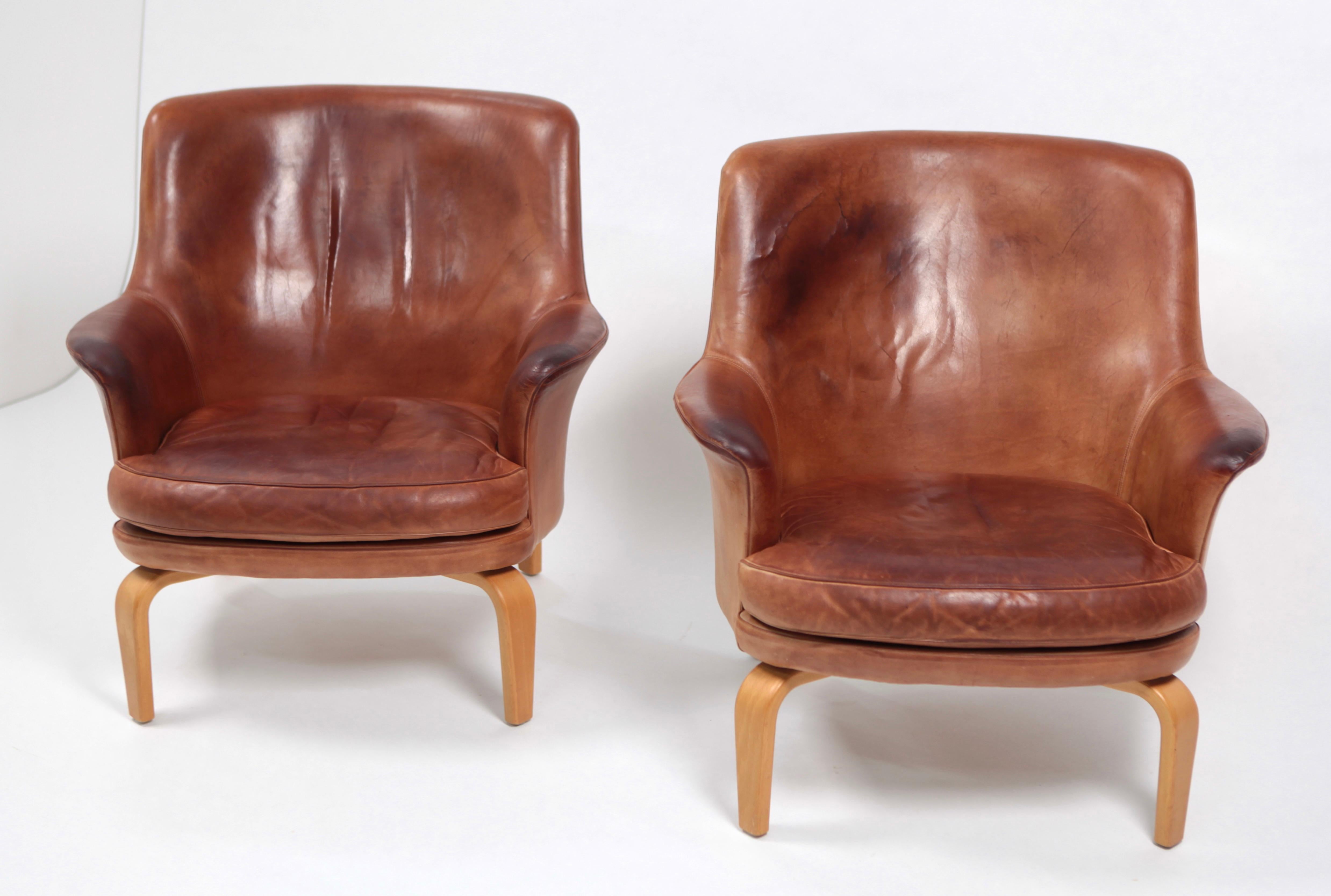 Paire de fauteuils Pilot d'Arne Norell, en cuir et hêtre, Suède, 1967 Bon état à Berlin, DE