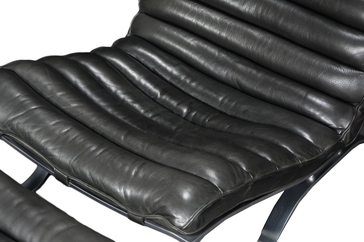 Scandinavian Modern Arne Norell ‘Ari’ Lounge Chair and Ottoman in black leather 1960s Scandinavian