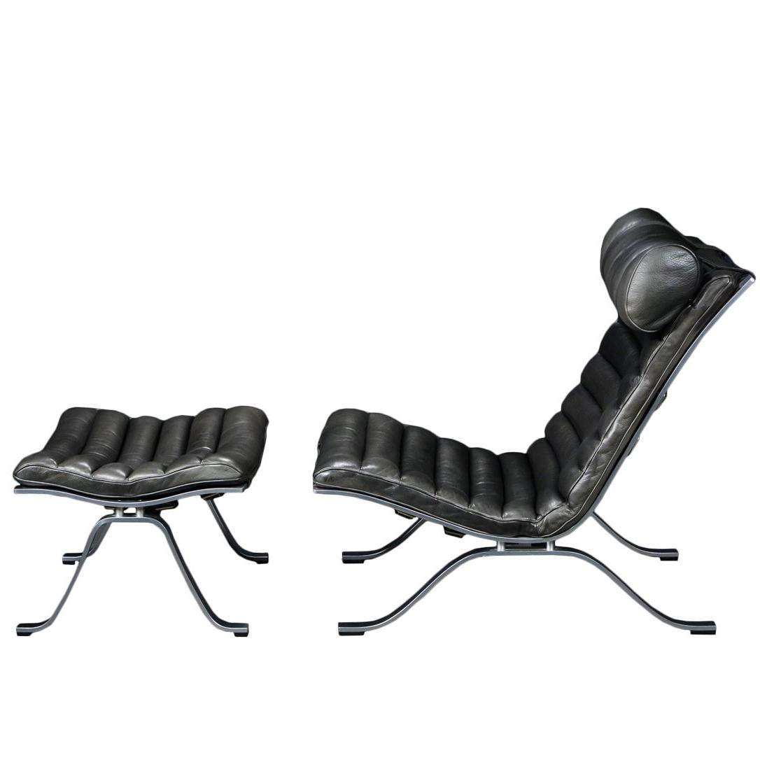 Arne Norell ‘Ari’ Lounge Chair and Ottoman in black leather 1960s Scandinavian