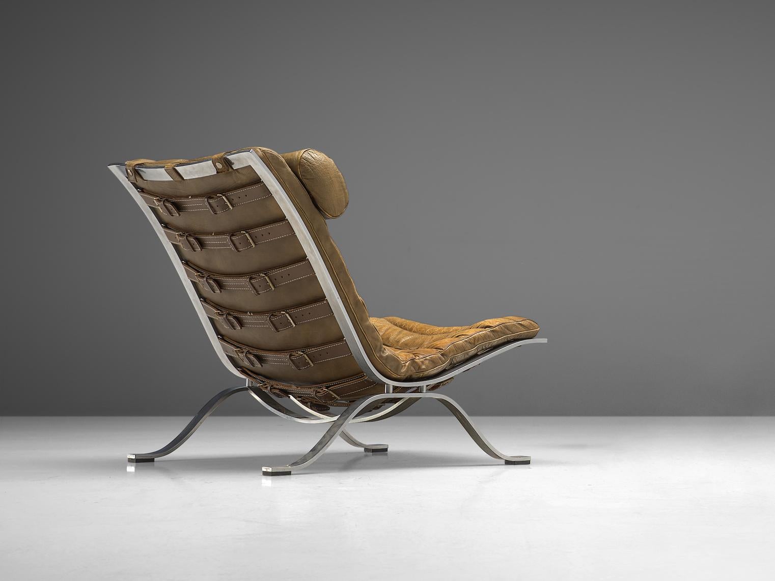 Arne Norell for Norell Møbel AB, 'Ari' lounge chair, leather, chrome-plated steel, Sweden, 1966 

This lounge chair is designed by Arne Norell. The whole frame is executed in chrome-plated steel, and the seat and back cushions are upholstered in