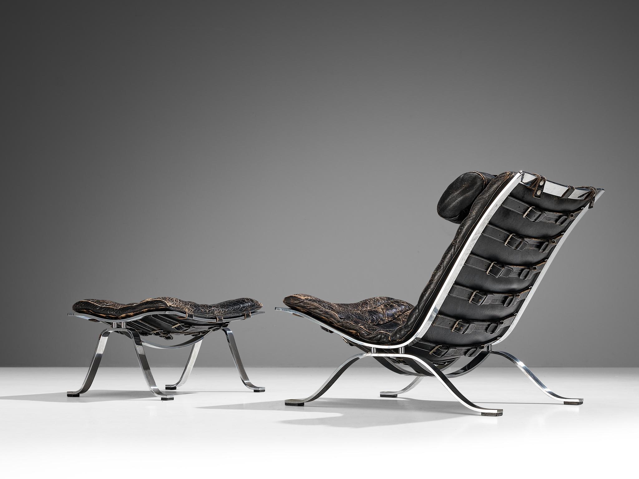 Scandinavian Modern Arne Norell 'Ari' Lounge Chair with Ottoman in Patinated Black Leather