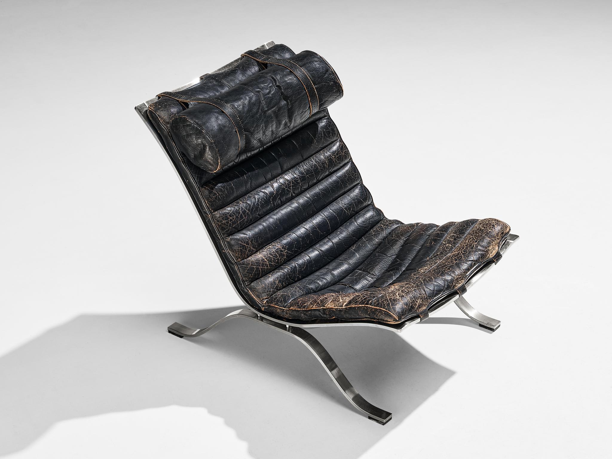 Arne Norell 'Ari' Lounge Chair with Ottoman in Patinated Black Leather 2