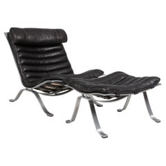 Arne Norells Chaise longue avec ottoman en cuir patiné