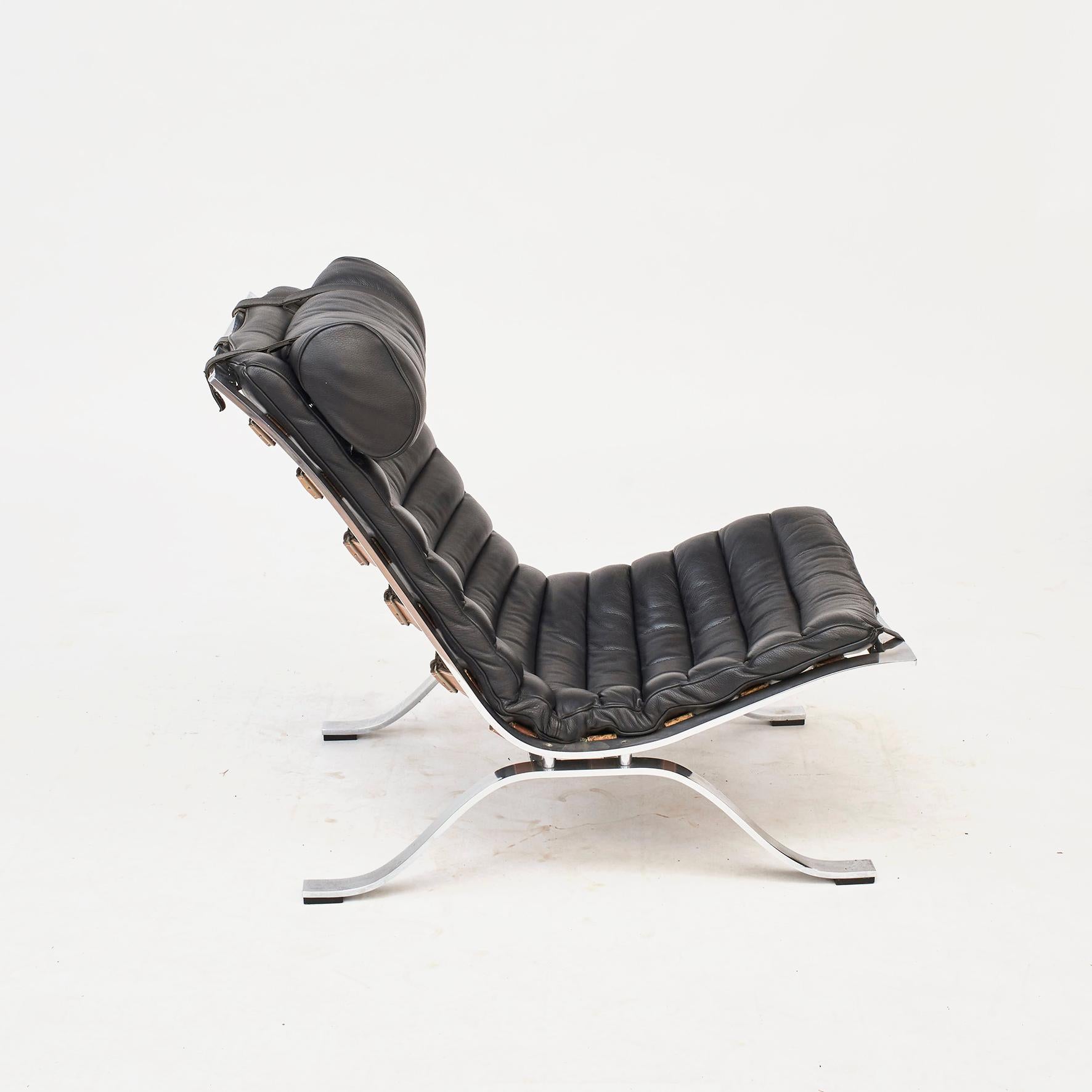 Arne Norell 1917-1971. 
Ari easy chairs designed and produced by Arne Norell in Solna, Sweden.
Made in chromed steel and black leather upholstery.

Designed in 1966.
This is from the late 1960s.
The leather upholstery was renewed approx. 10 yeas
