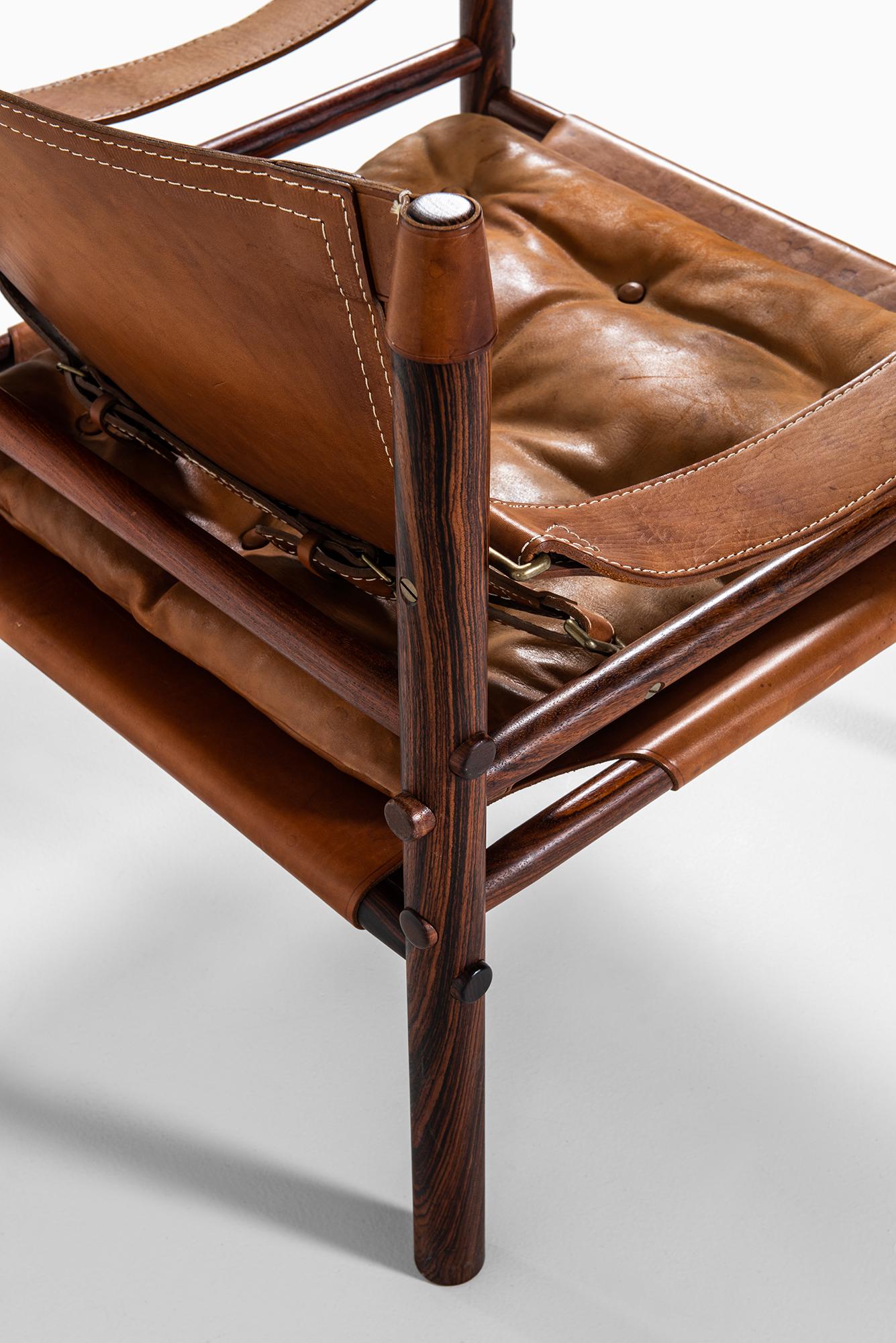 Swedish Arne Norell Easy Chairs Model Sirocco in Rosewood and Brown Leather
