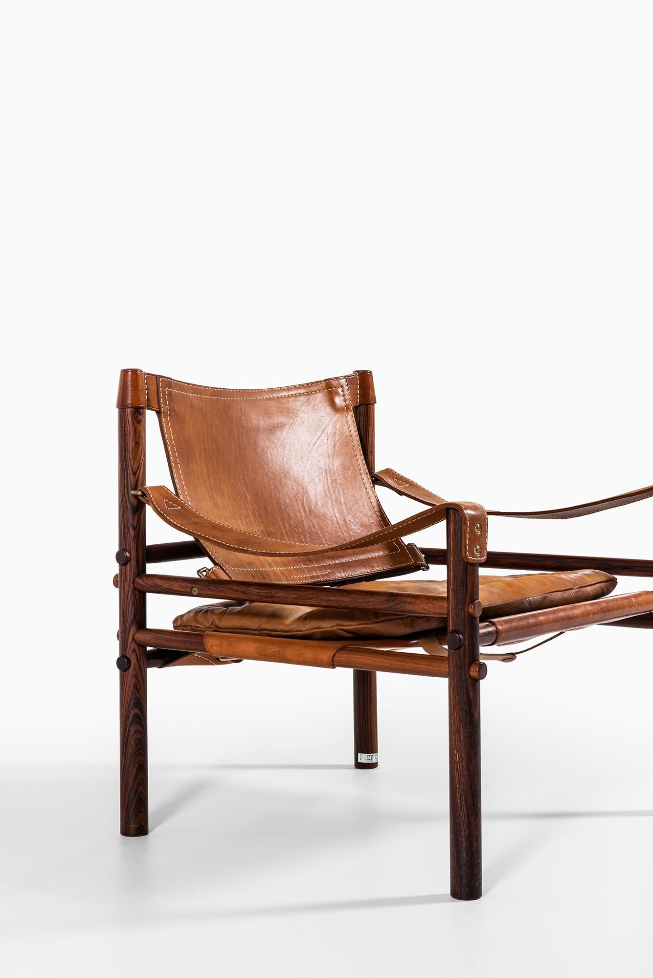 Arne Norell Easy Chairs Model Sirocco in Rosewood and Brown Leather 2