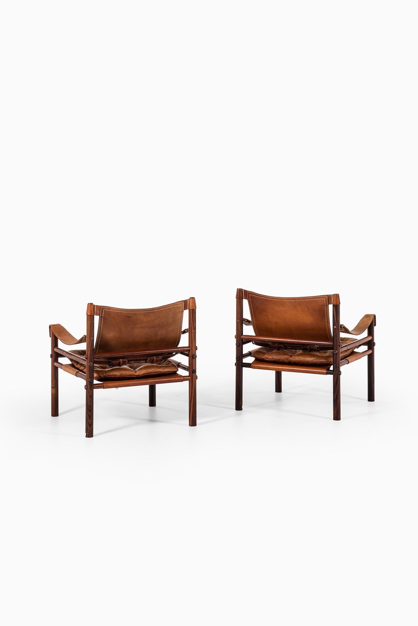 Arne Norell Easy Chairs Model Sirocco in Rosewood and Brown Leather 3