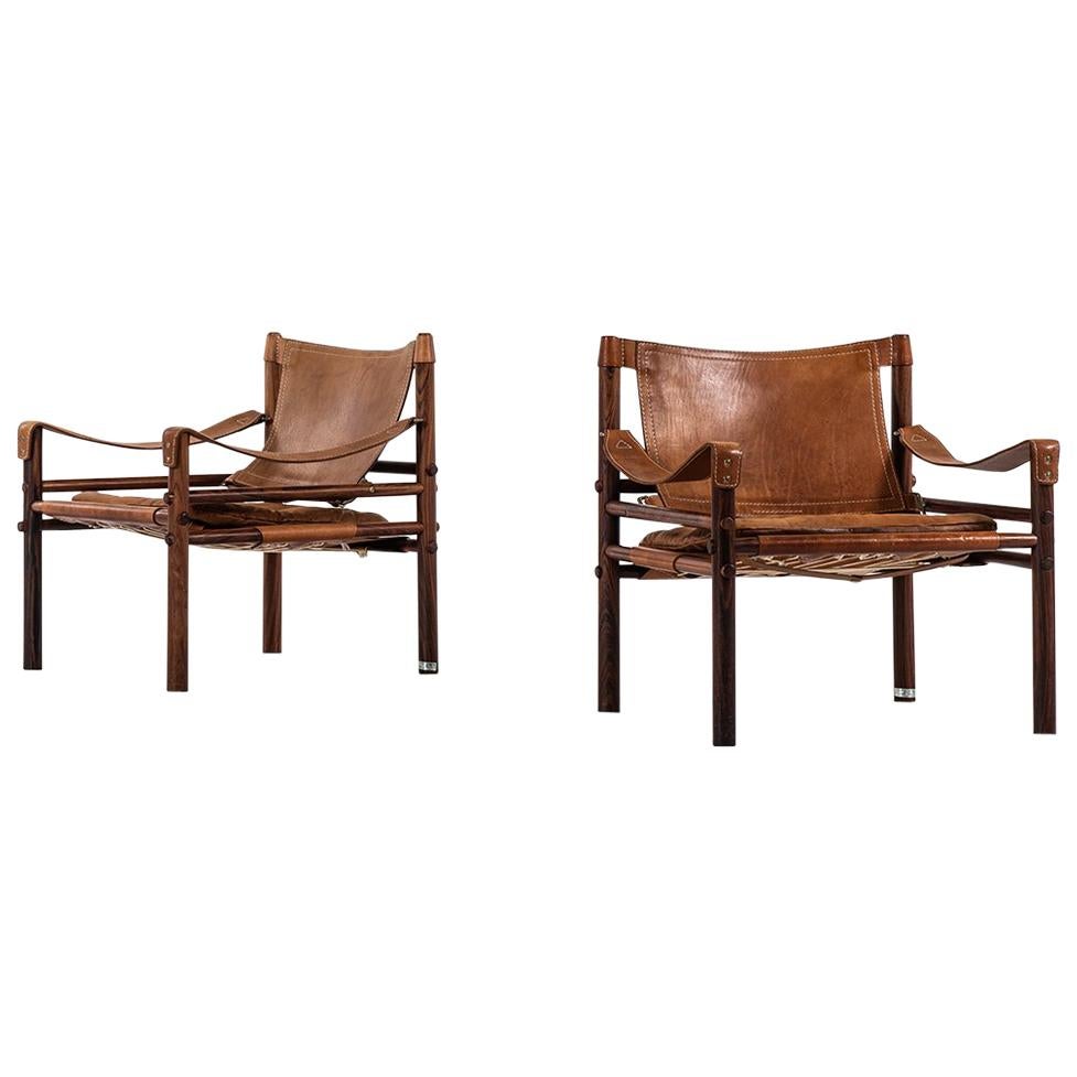 Arne Norell Easy Chairs Model Sirocco in Rosewood and Brown Leather