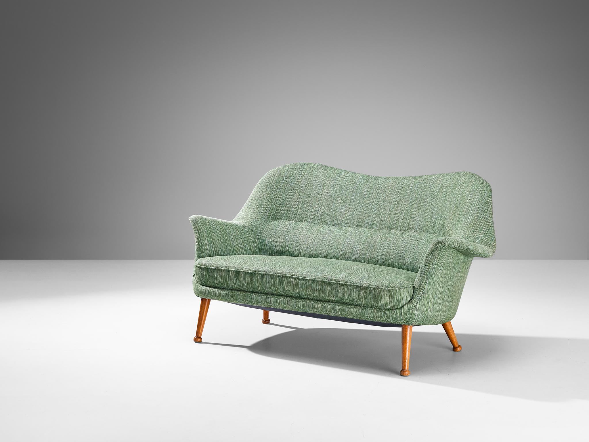 Arne Norell for Westbergs Möbler, 'Divina' sofa, fabric, stained beech, Sweden, late 1950s

This 'Divina' sofa is designed by Swedish designer Arne Norell. The seat is characterized by a shell construction with curvaceous lines. The back develops