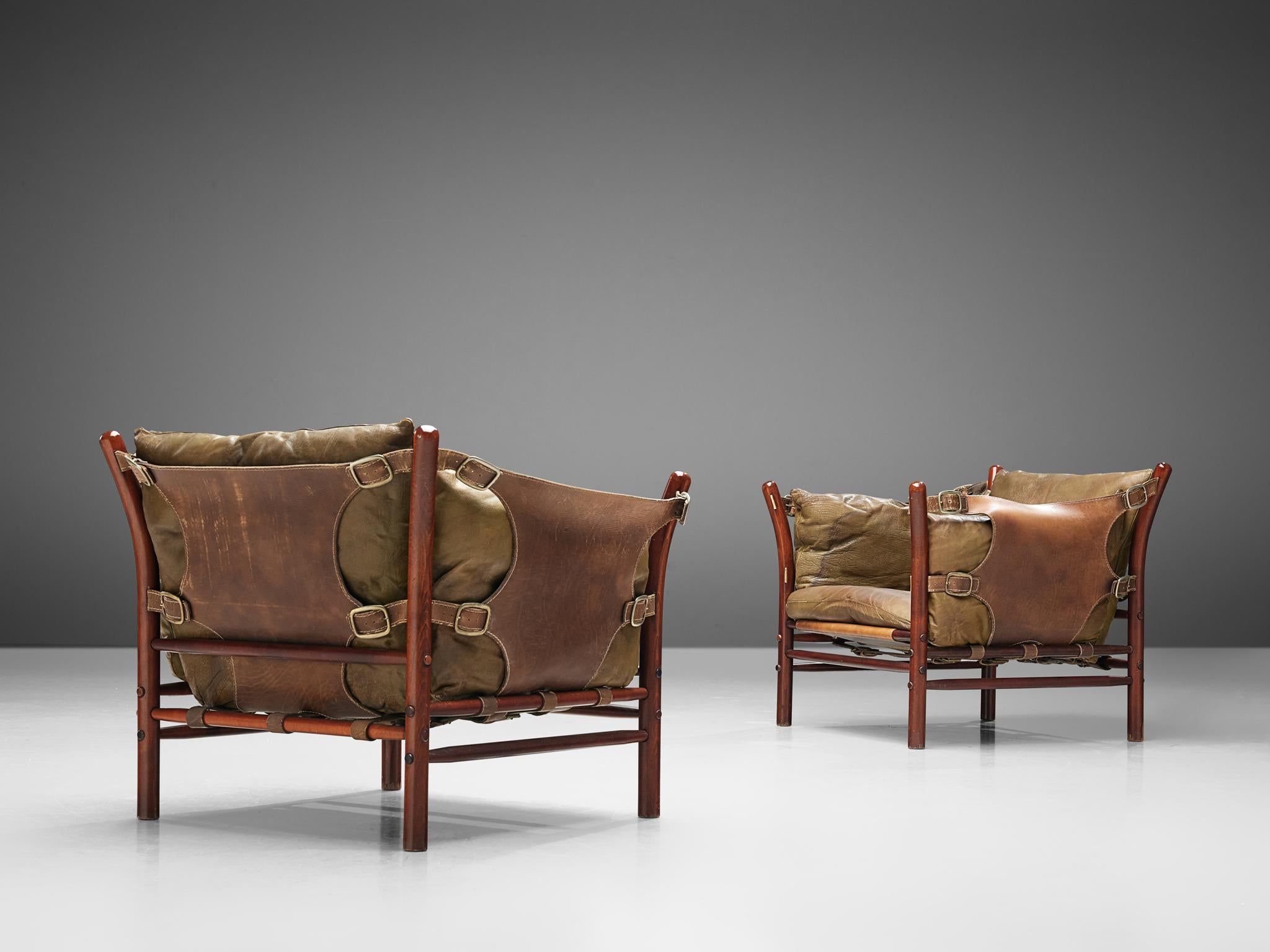 Arne Norell, set of two 'Ilona' lounge chairs, in rosewood and leather, Sweden, 1960s. 

Very nice contrasting pair of easy chairs by Arne Norell. The pair is designed with very thick and rich leather which shows a certain luxury for that time.