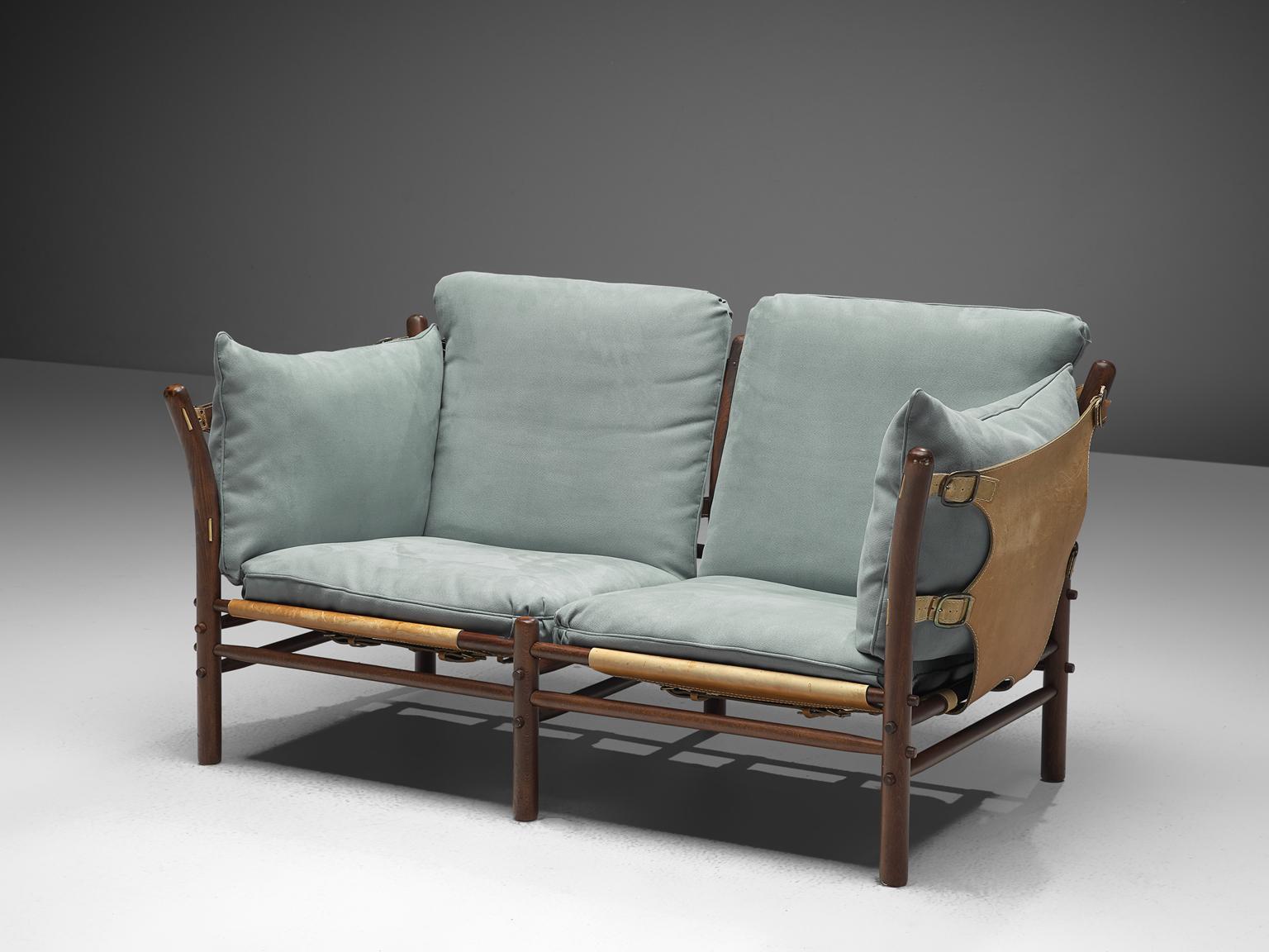 Arne Norell for Norell Möbel, two-seat 'Ilona' sofa, buffalo leather, fabric and beech, Sweden, 1970s.

Swedish two-seat sofa designed by Arne Norell in the 1970s. Beautiful thick buffalo leather is spanned to the beech frame to create the