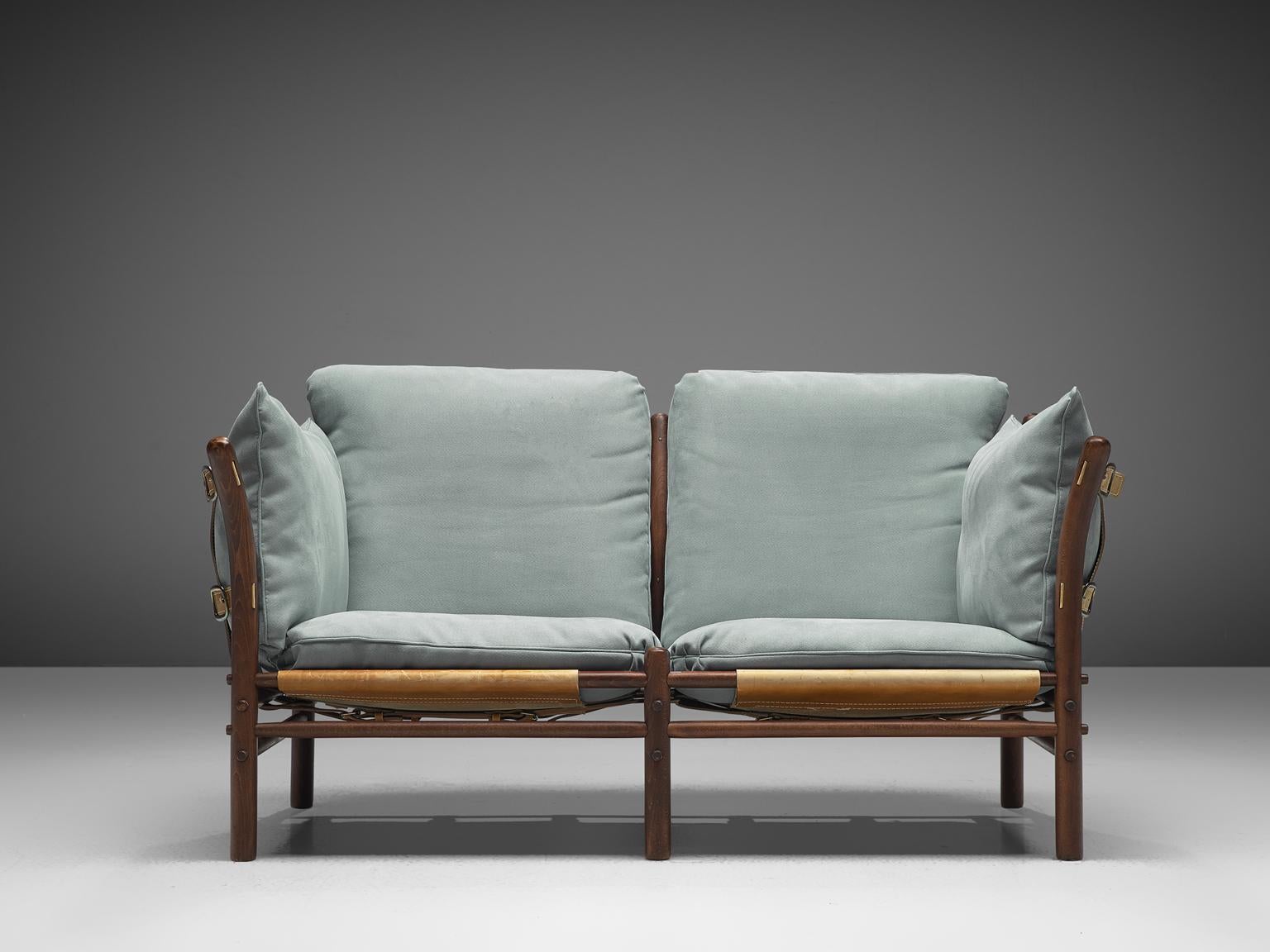 Arne Norell for Norell Möbel, two-seat 'Ilona' sofa, buffalo leather, fabric and beech, Sweden, 1970s.

Swedish two-seat sofa designed by Arne Norell in the 1970s. The wooden frame in stained beech is characterized by the circular diameters of the