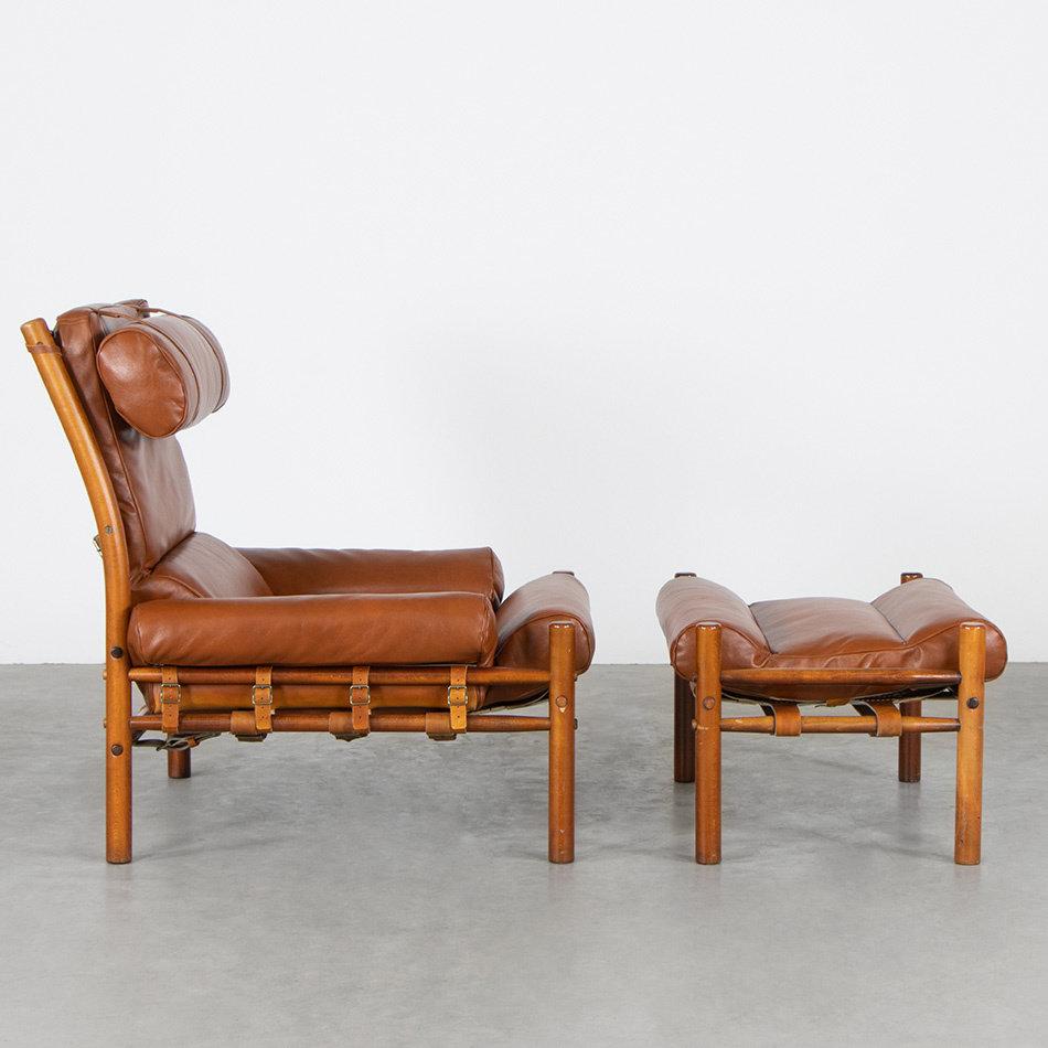 Comfortable Inca Lounge Chair designed by Arne Norell for Norell Möbell AB Sweden. Stained beech wood frame with normal traces of use and new chestnut brown leather upholstery all in very good vintage condition.