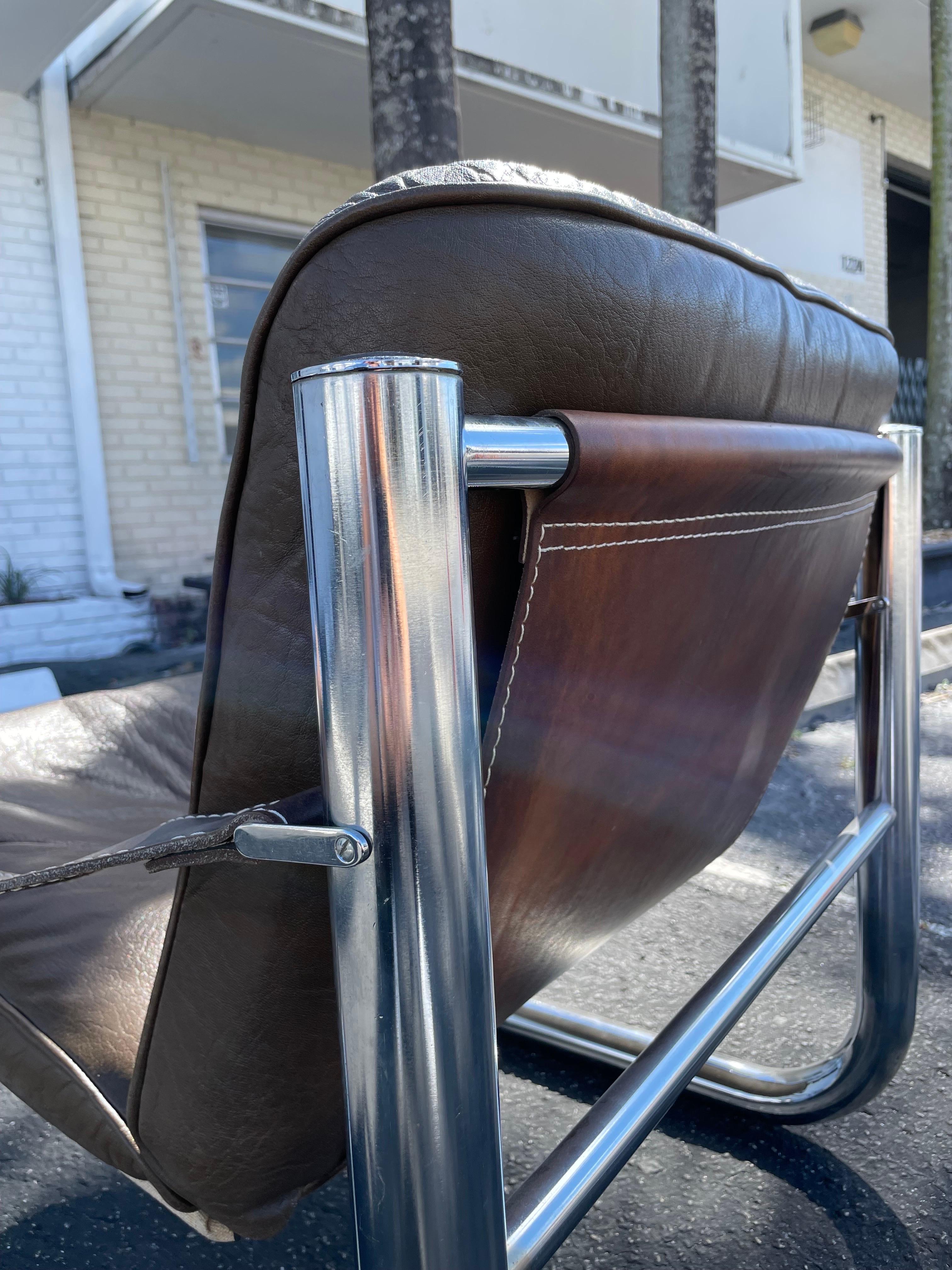 Rare Arne Norell Safari Chair. Tubular chrome and brown leather. Labeled.