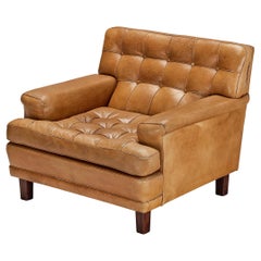 Chaise longue 'Merkur' d'Arne Norell en cuir cognac et acajou 