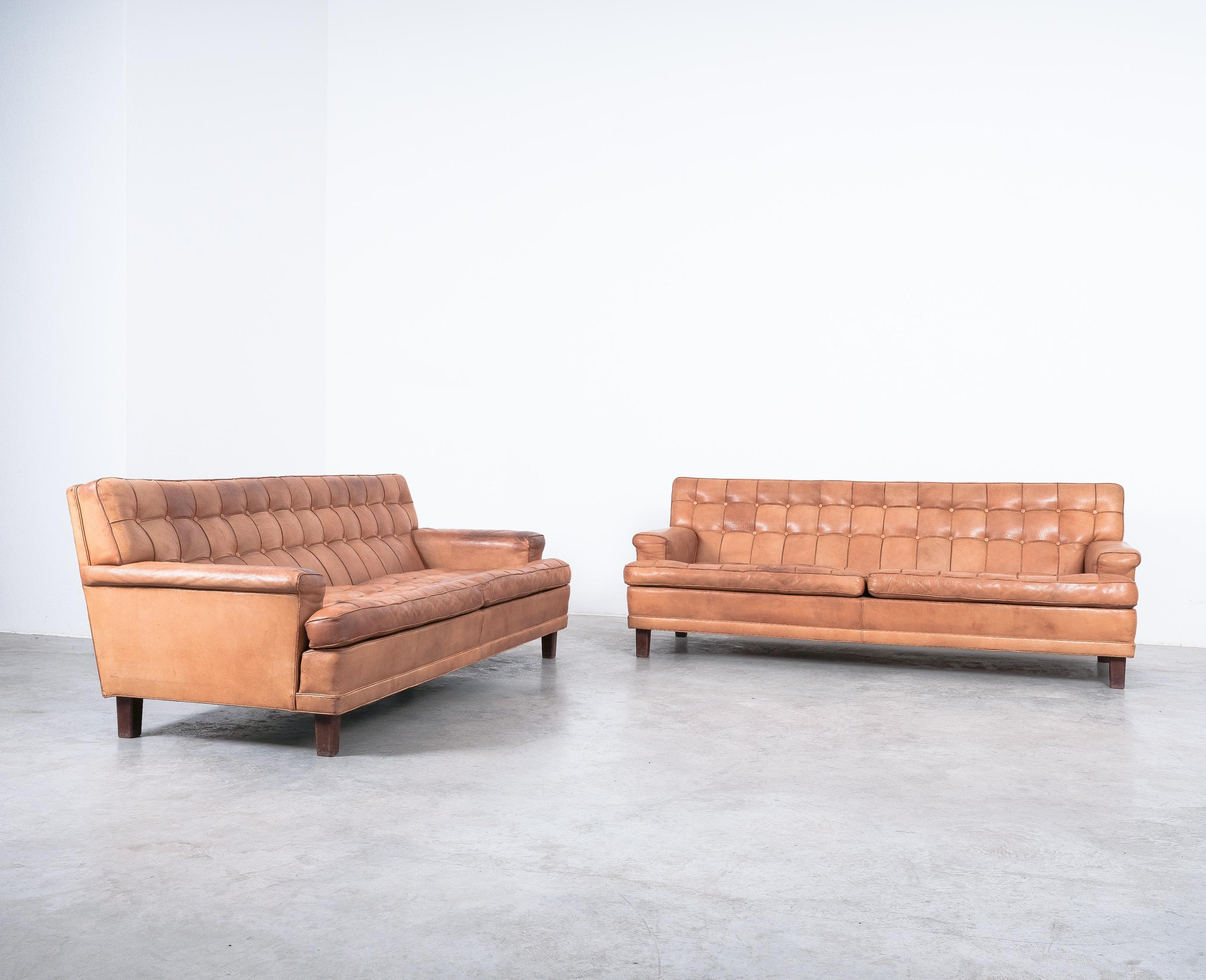 Pair of identical cognac leather large 3-seat sofas by Arne Norell, Sweden 1960

Priced as a pair, please inquire if you wish to pirchase a single piece only.

Great comfort sofas in good condition with a beautiful patina to the original leather.