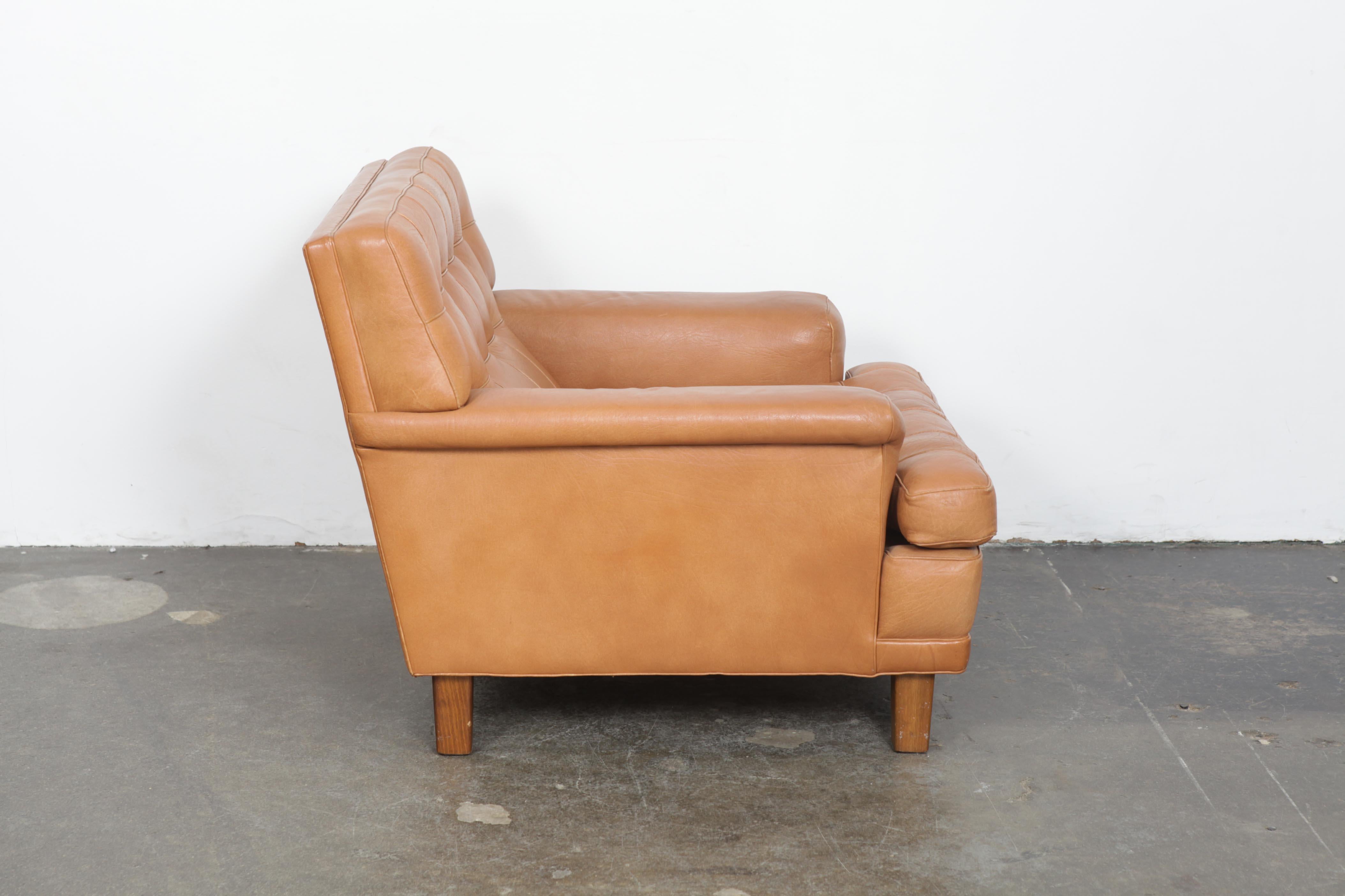 Scandinavian Modern Arne Norell Merkur Tan Leather Tufted Lounge Chair, Sweden, Norell AB