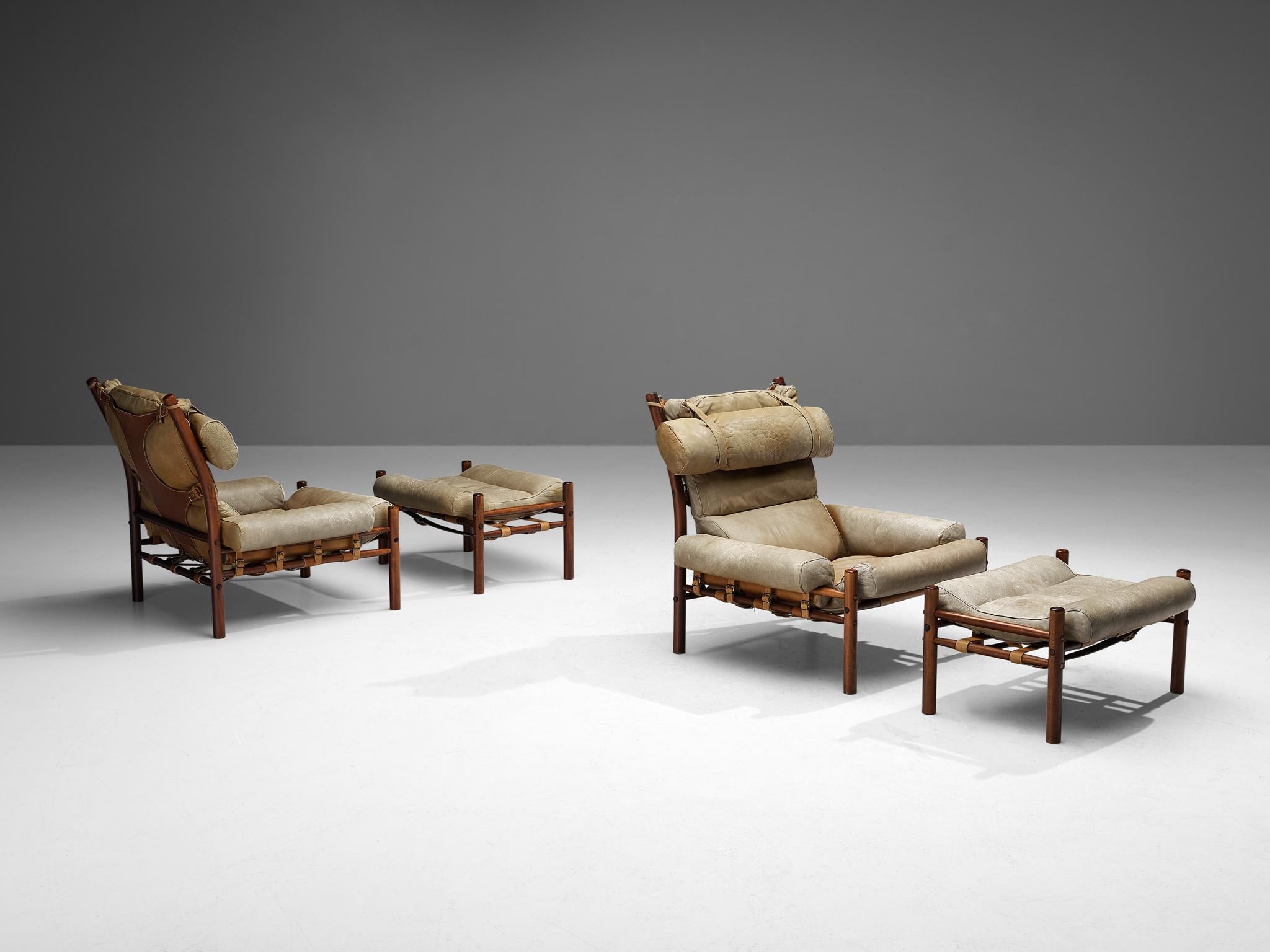 Arne Norell for Norell Möbel AB, pair of 'Inca' lounge chairs with ottomans, leather, stained beech, Sweden, 1960s

A pair of iconic 'Inca' lounge chairs with ottomans executed in a beige to sand colored leather designed by Arne Norell. The frame