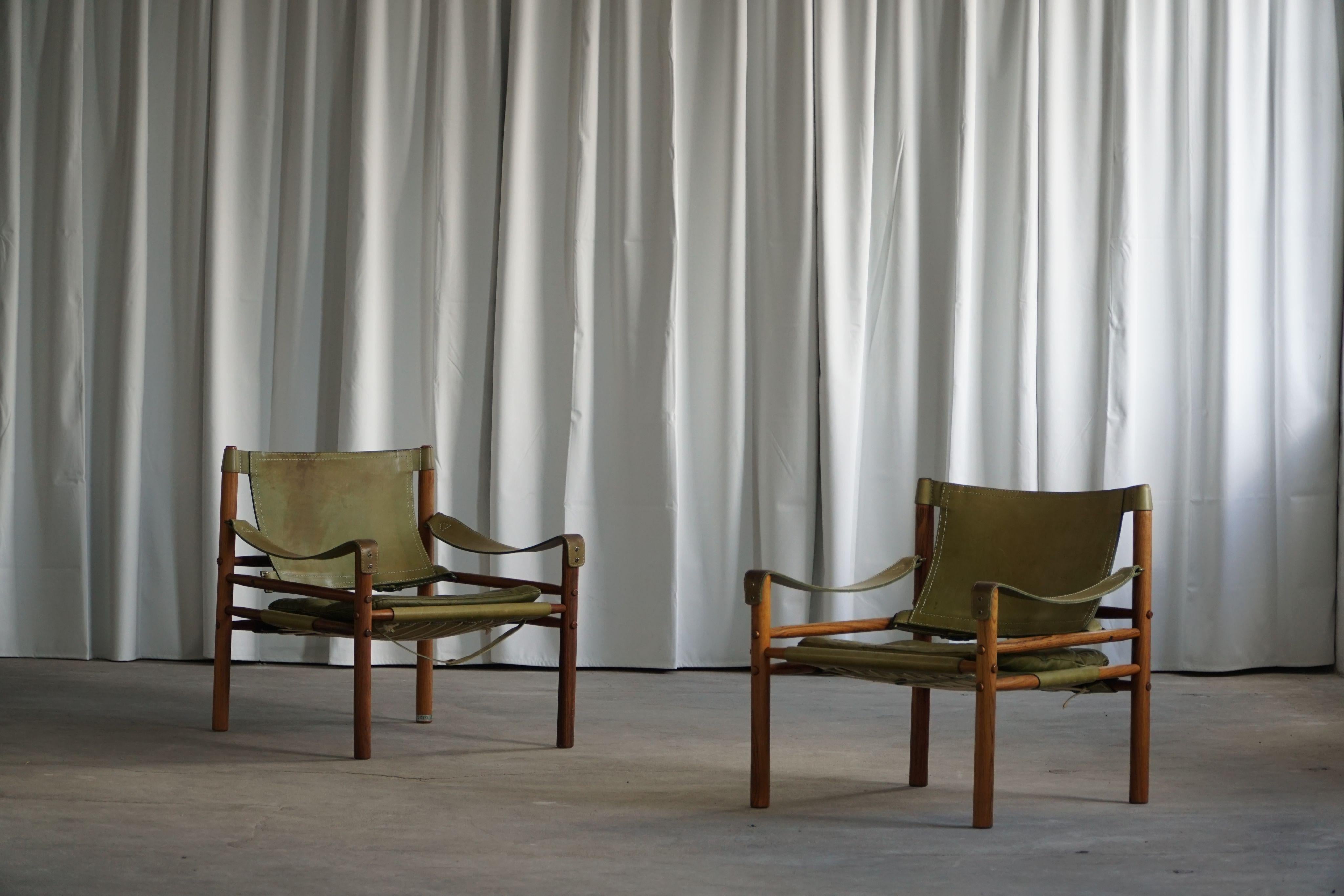 Arne Norell, paire de chaises longues Sirocco, cuir et bois de rose, AB Aneby, années 1960 en vente 4
