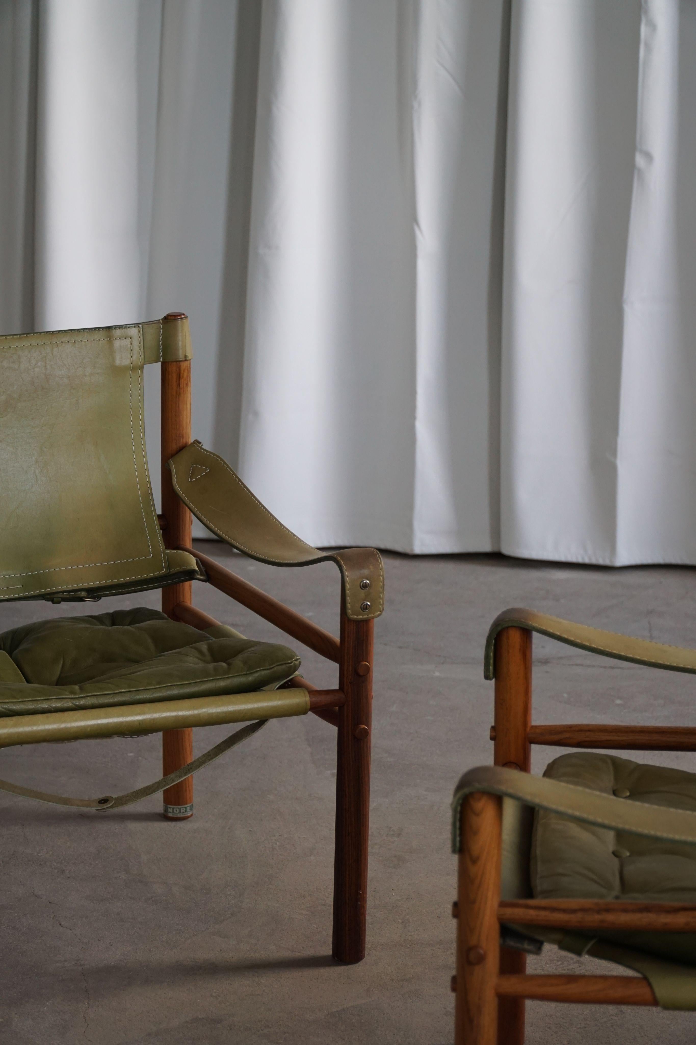 Arne Norell, paire de chaises longues Sirocco, cuir et bois de rose, AB Aneby, années 1960 en vente 8