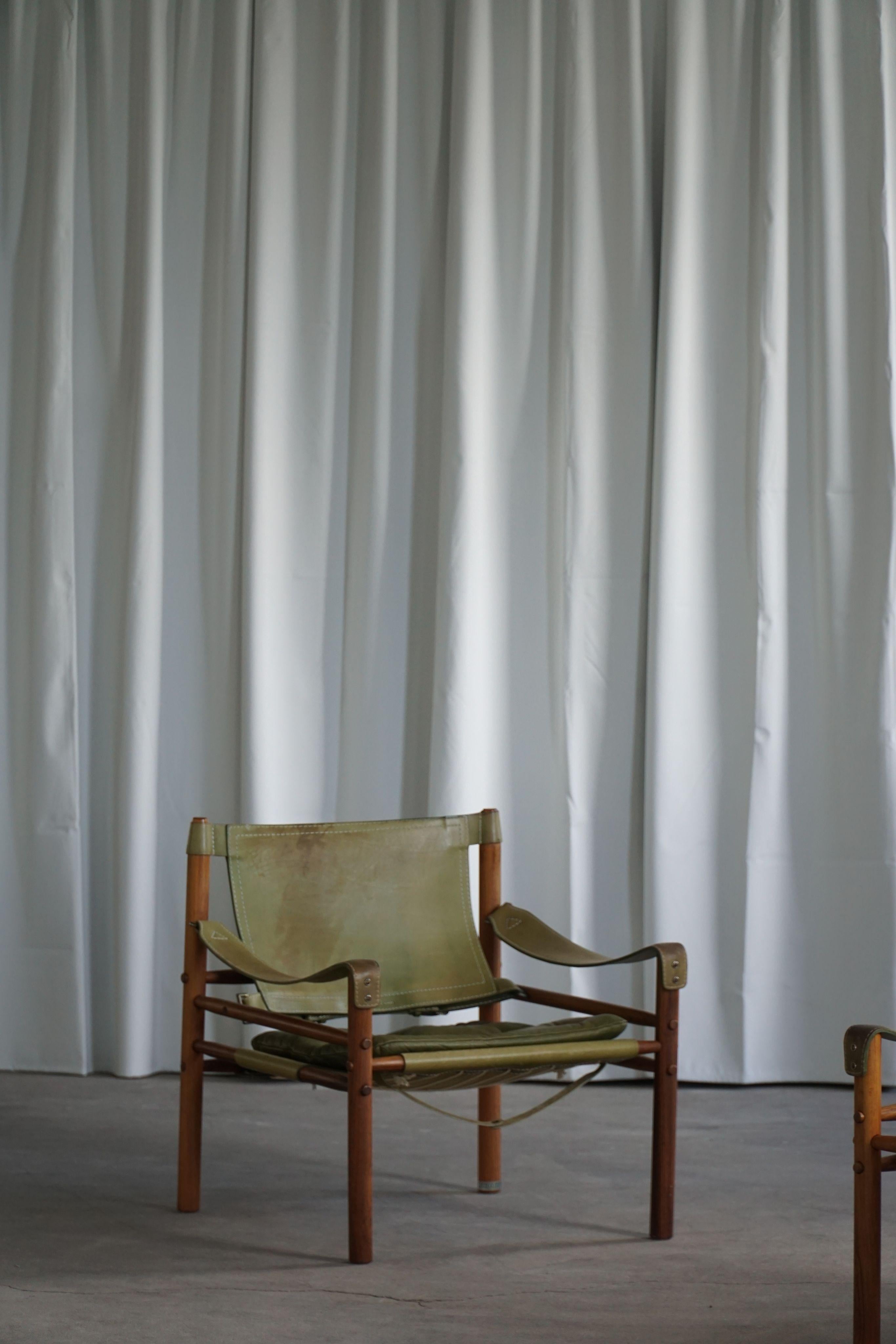 Arne Norell, paire de chaises longues Sirocco, cuir et bois de rose, AB Aneby, années 1960 en vente 1