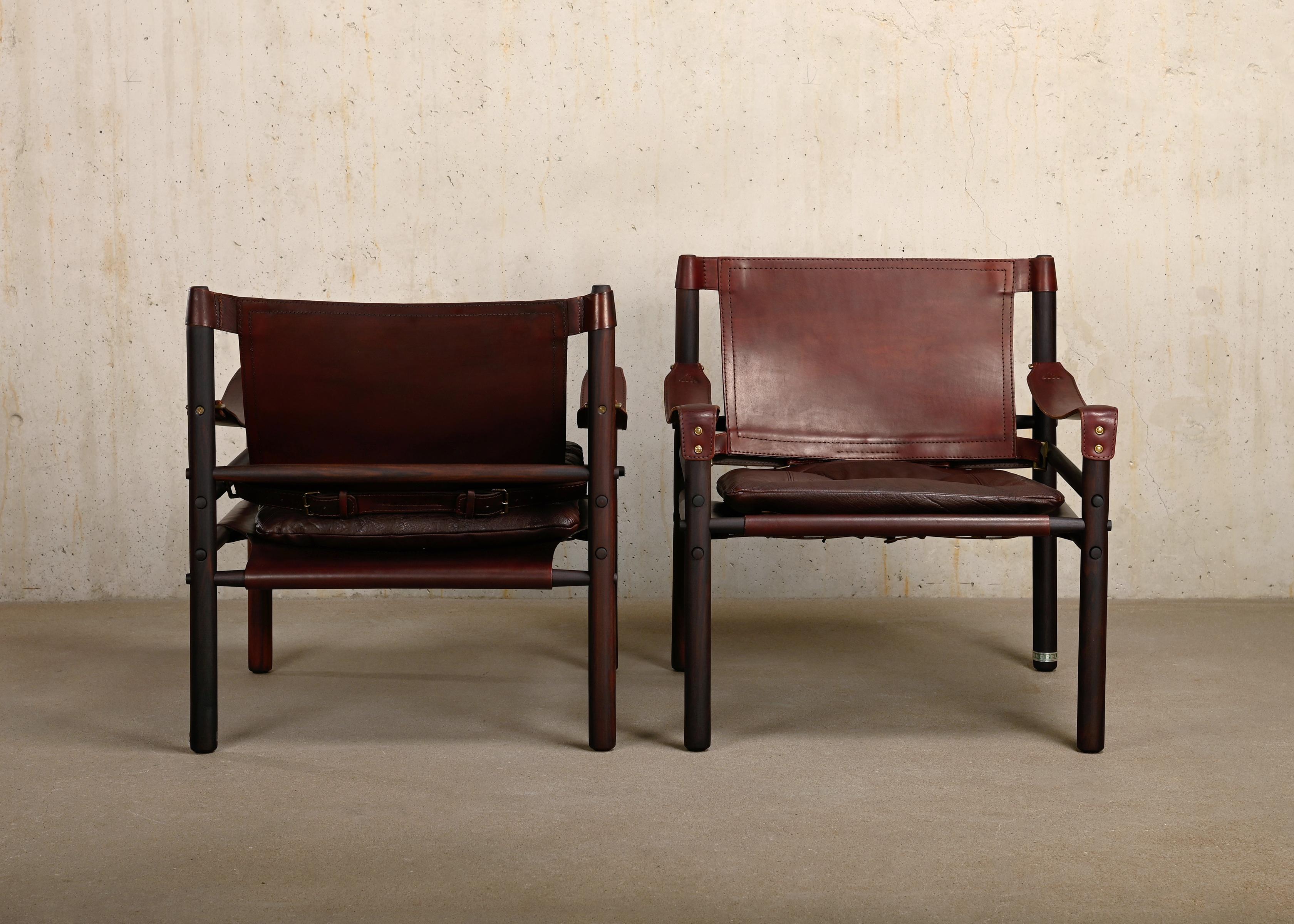 Swedish Arne Norell pair Sirocco Safari Lounge Chairs in Chocolate leather, Sweden