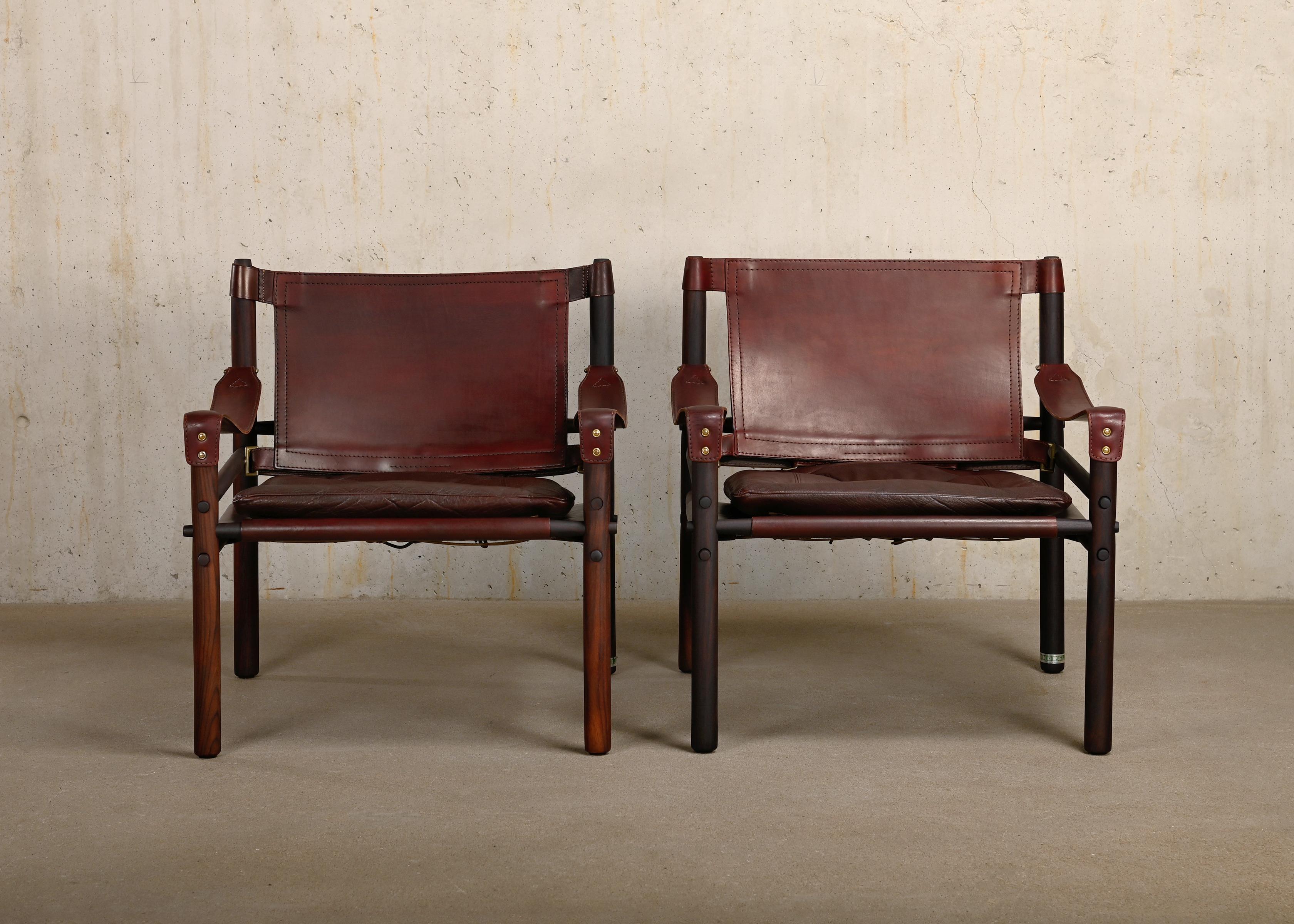 Arne Norell pair Sirocco Safari Lounge Chairs in Chocolate leather, Sweden In Good Condition In Amsterdam, NL