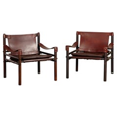 Arne Norell pair Sirocco Safari Lounge Chairs in Chocolate leather, Sweden