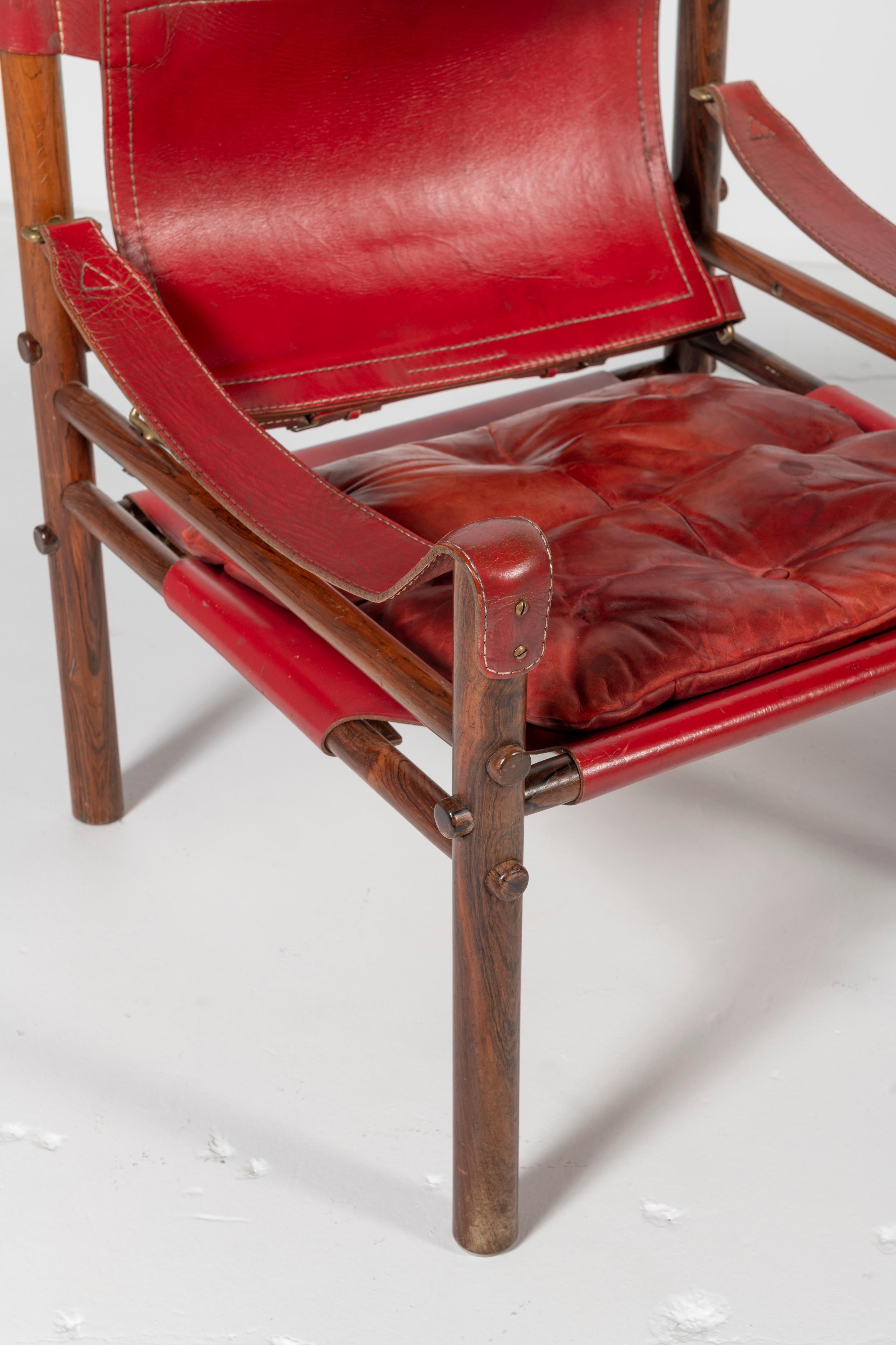 Scandinavian Modern Arne Norell Red Leather and Wood Safari Chairs For Sale