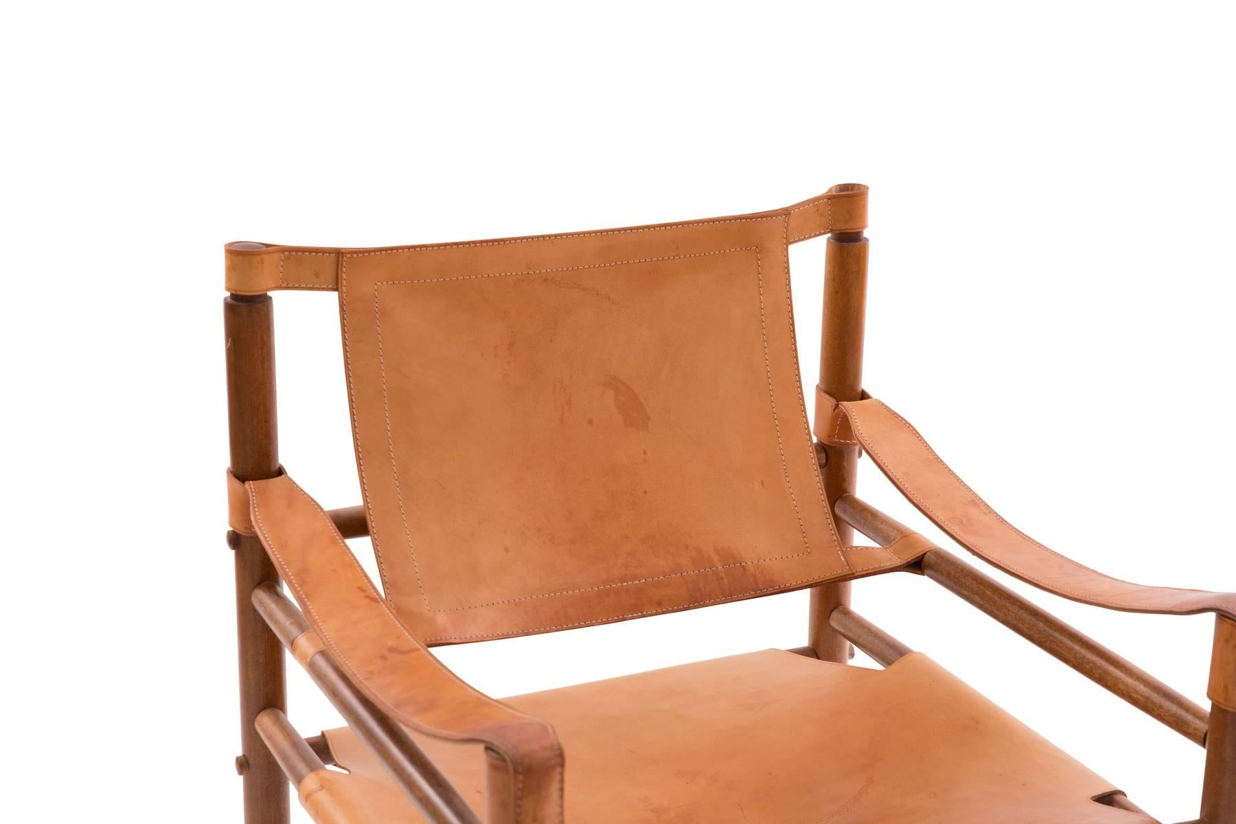 All original Arne Norell Safari chair, circa late 1960s. This all original example has beautifully patinated leather seat and back and is extremely comfortable.