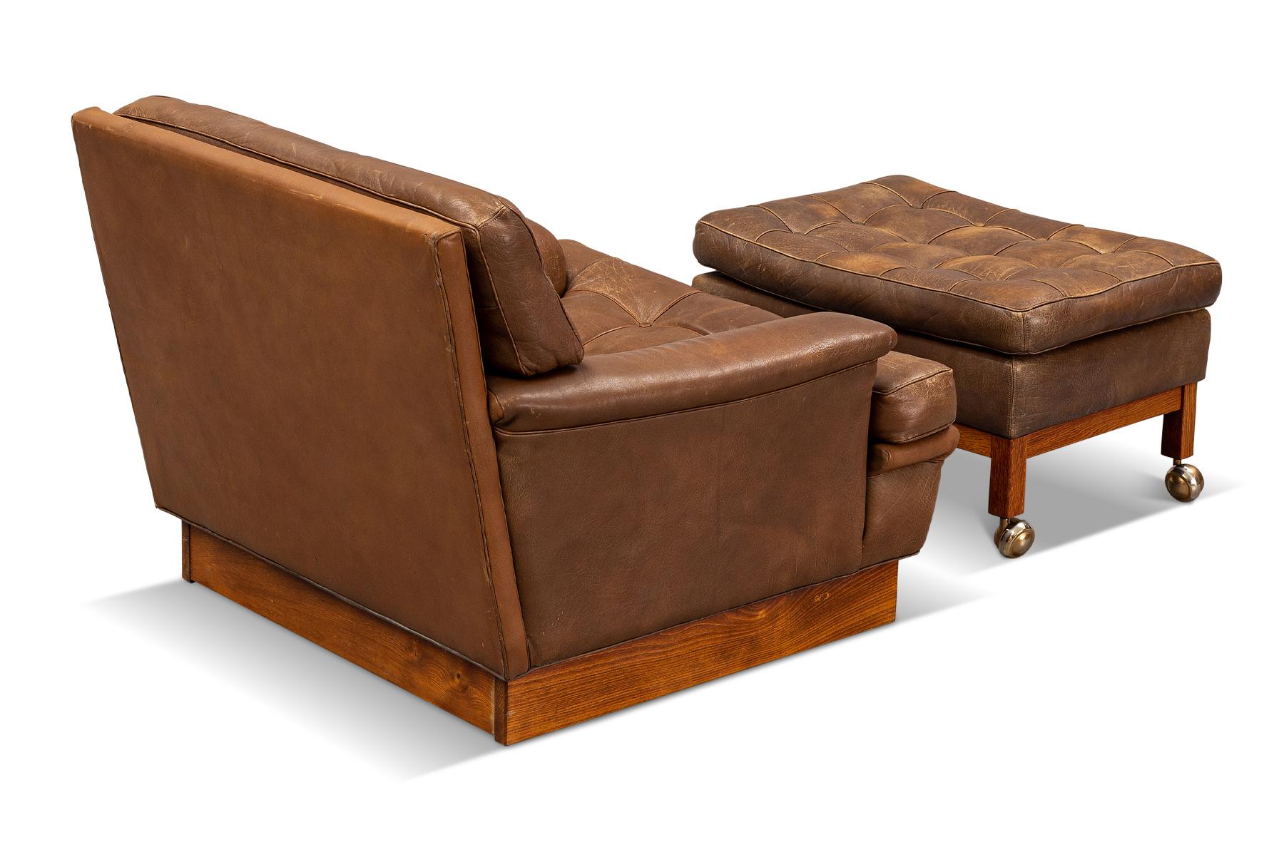 Suédois Arne Norell fauteuil de salon Saturn + repose-pieds en cuir brun en vente