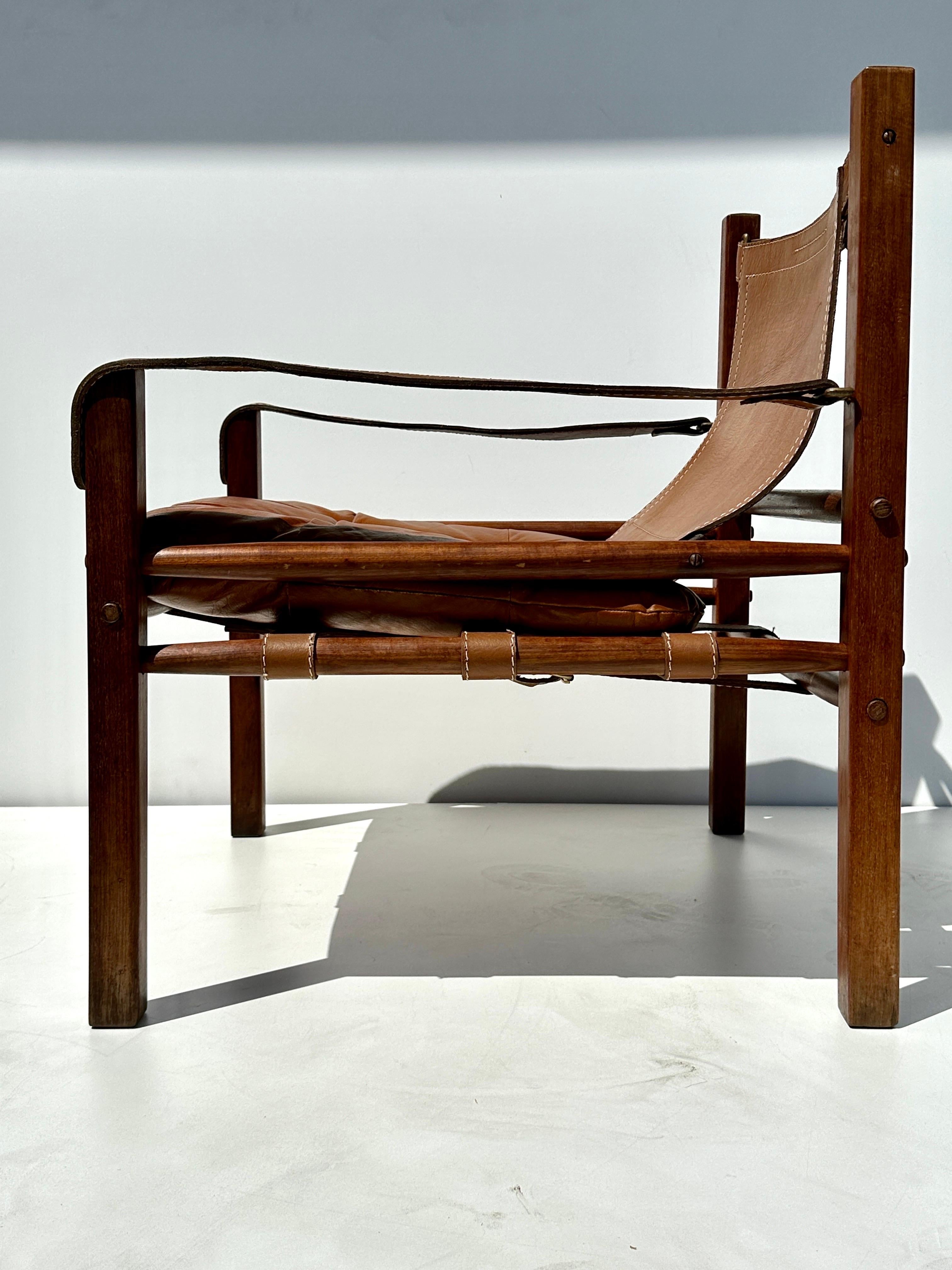 Arne Norell Sirocco teak and cognac leather safari chair for Scanform made in Colombia.