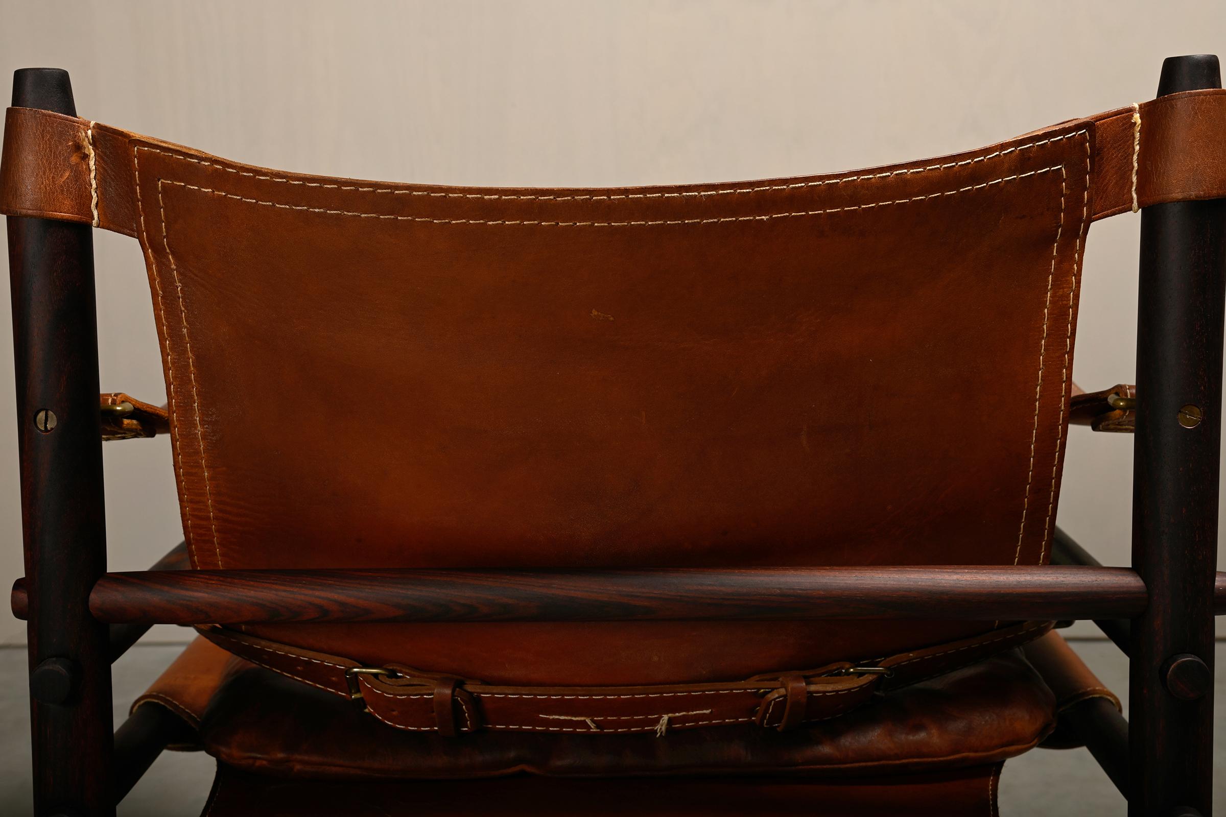 Arne Norell Sirocco Safari Lounge Chair aus dunkelbraunem Holz und Leder, Schweden im Angebot 10