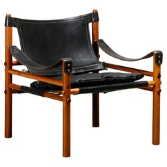 Arne Norell Sirocco Safari Lounge Chair en bois de rose et cuir noir, Suède