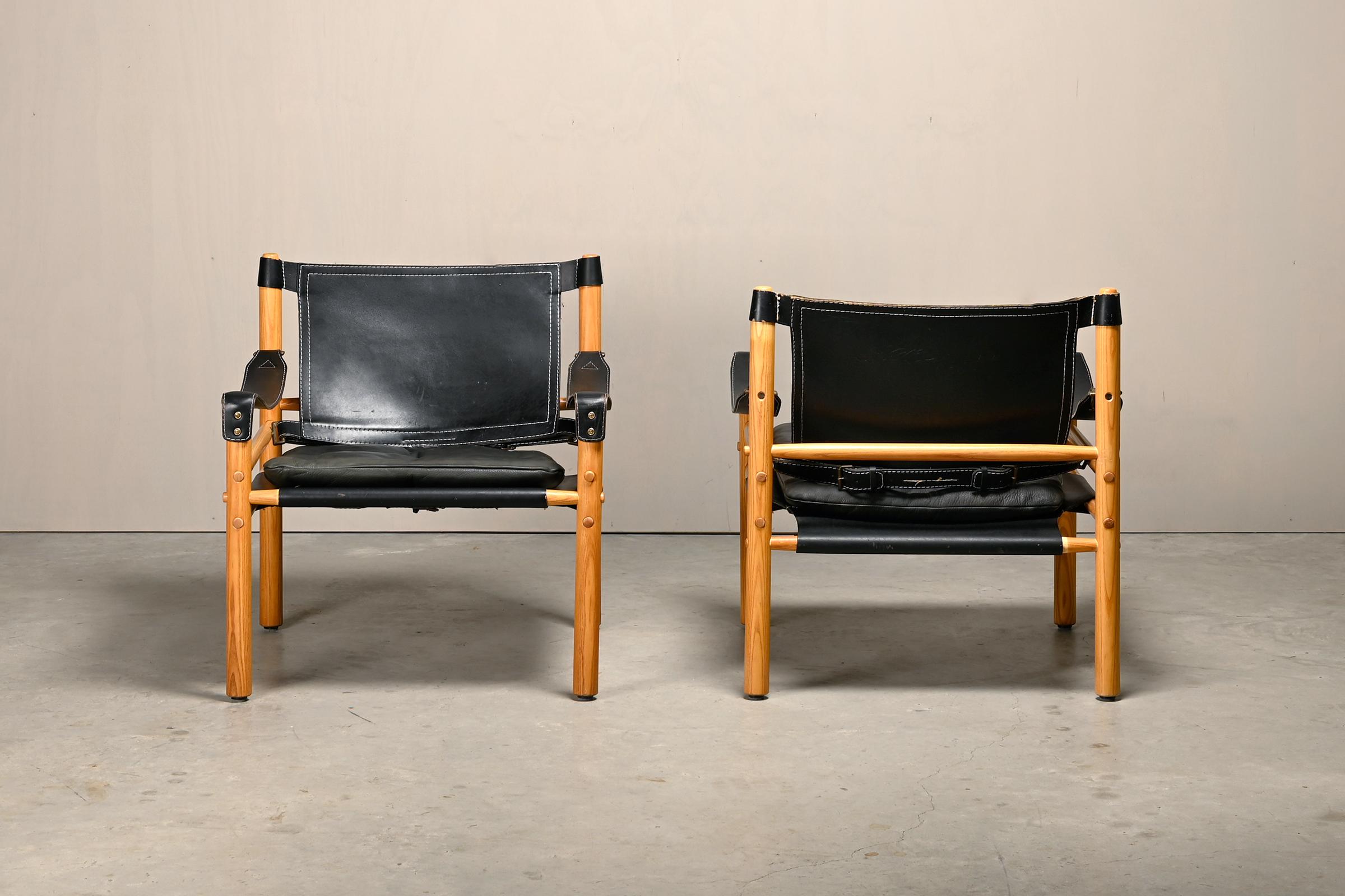 Arne Norell Sirocco Safari Sillones de cuero negro y fresno, Suecia Sueco en venta