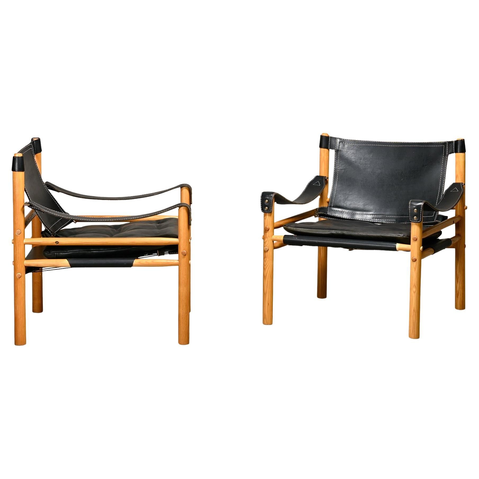 Arne Norell Sirocco Safari Sillones de cuero negro y fresno, Suecia