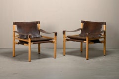 Arne Norell Sirocco Safari Lounge Chairs in dark brown leather and ash, Sweden