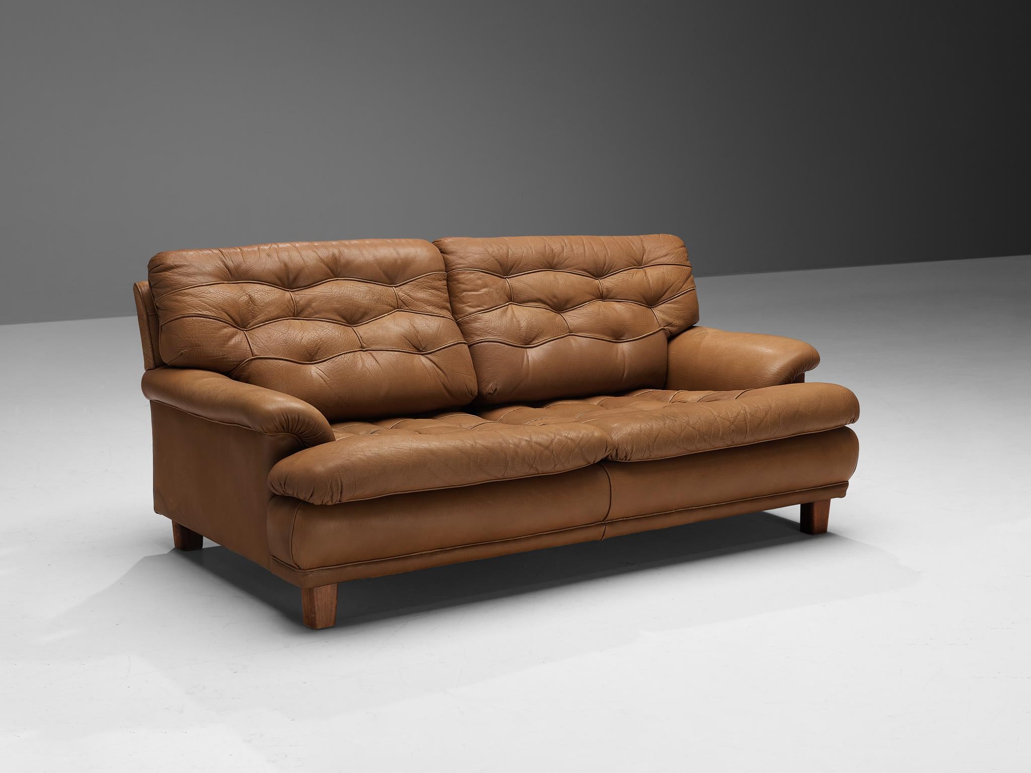 Arne Norell, sofa, brown leather, wood, Sweden, circa 1960s

This sofa is refined, modern with a robust touch. A well-designed sofa by talented Swedish designer Arne Norell (1917-1971). Characteristic for this design are the backrest cushions
