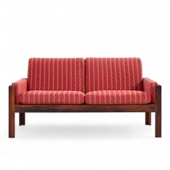 Sofá loveseat de palisandro danés de mediados de siglo estilo Arne Norell