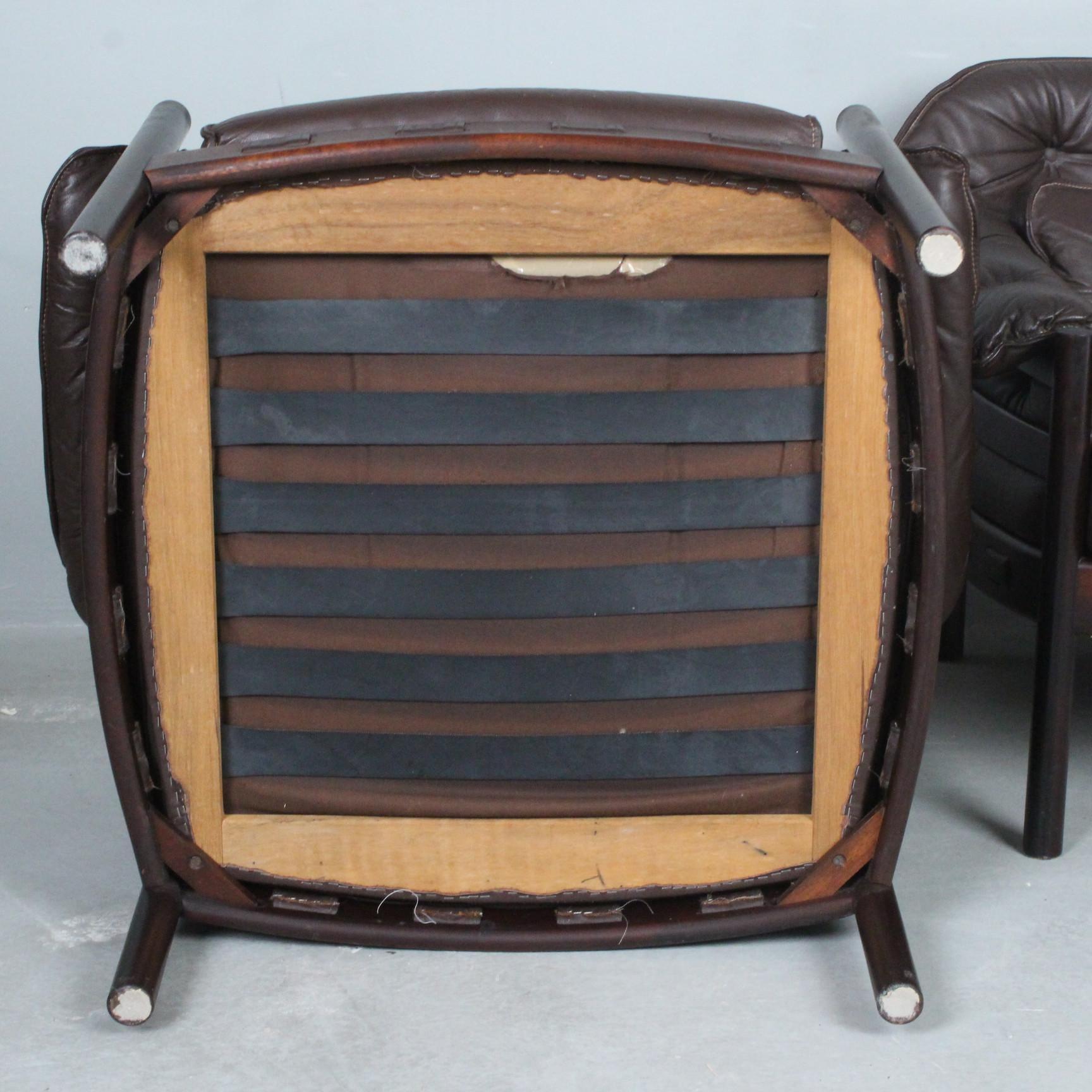 Arne Norell and Sven Ellekaer for Coja, two armchairs/armchairs made by Coja in Sweden, 1960s,
mahogany construction, brown leather upholstery,
Dimensions of each approx.: h. 74 cm, seat height 42 cm, W. 89 cm, depth 72 cm.
Good condition, leather