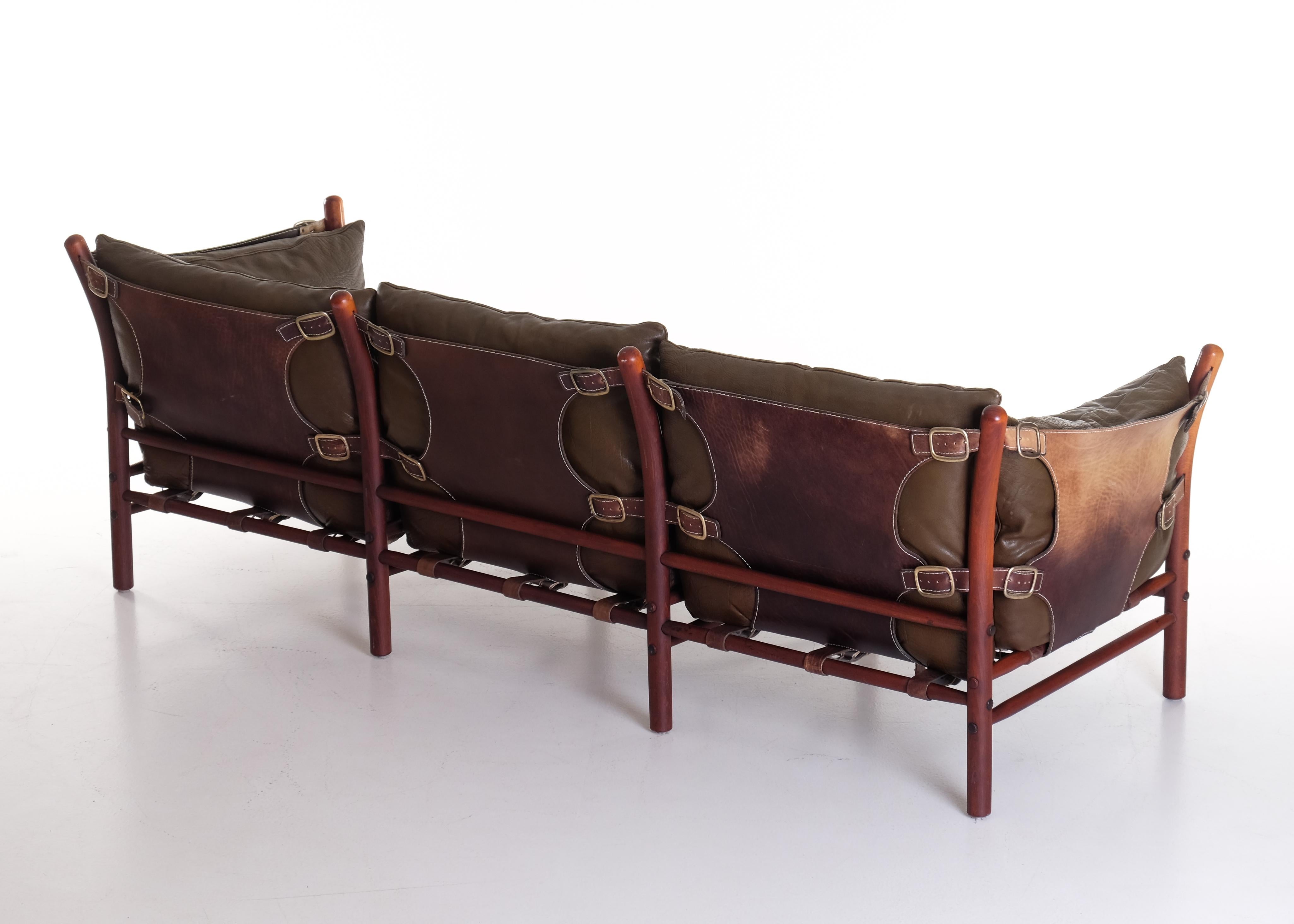 Three-seat. Brown original leather, brass, stained beech. Good condition.
Design by Arne Norell, produced by Arne Norell Möbel, Sweden.