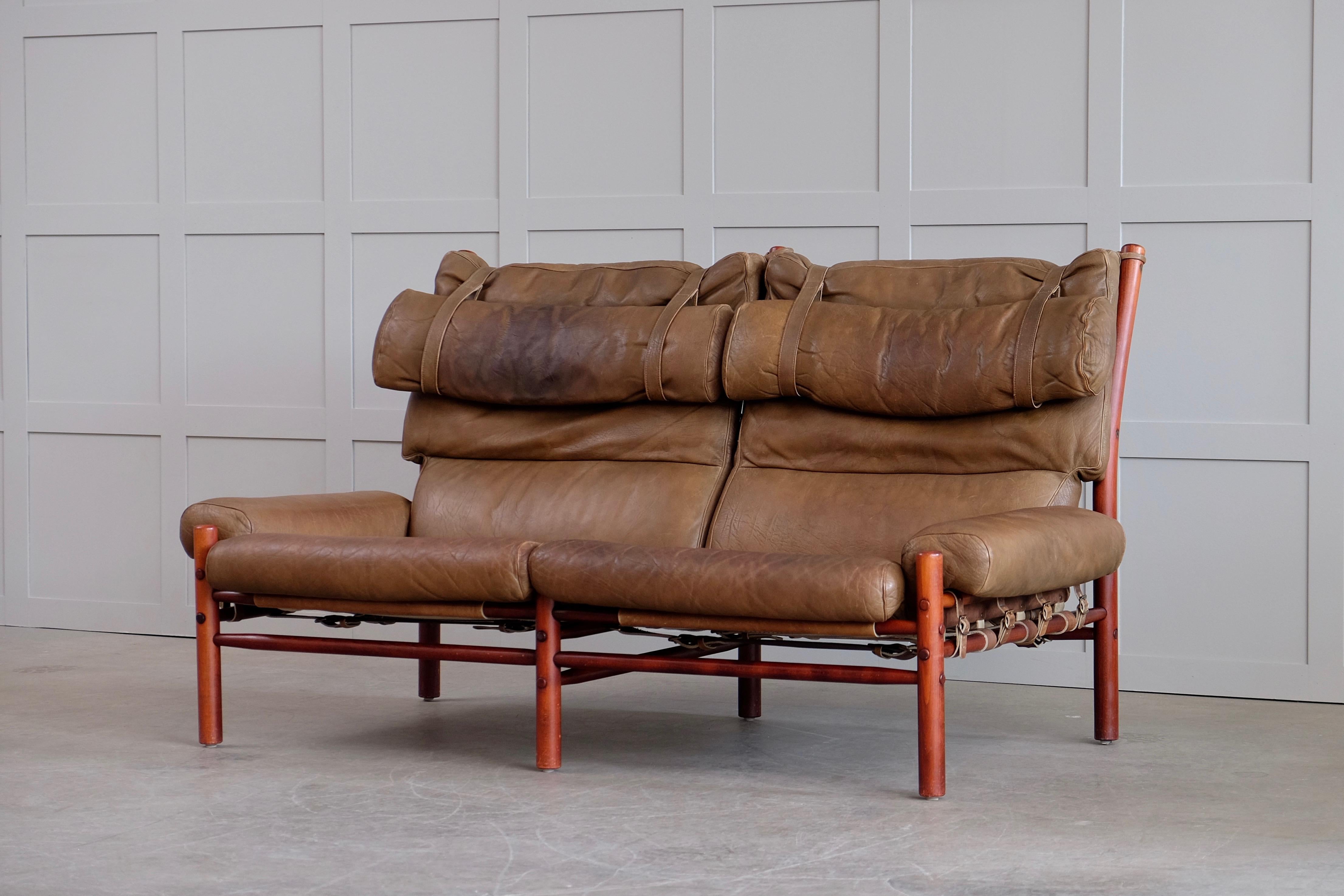 Two-seat Inca with original brown leather, brass, stained beech.
Design by Arne Norell, produced by Arne Norell Möbel, Sweden.



                