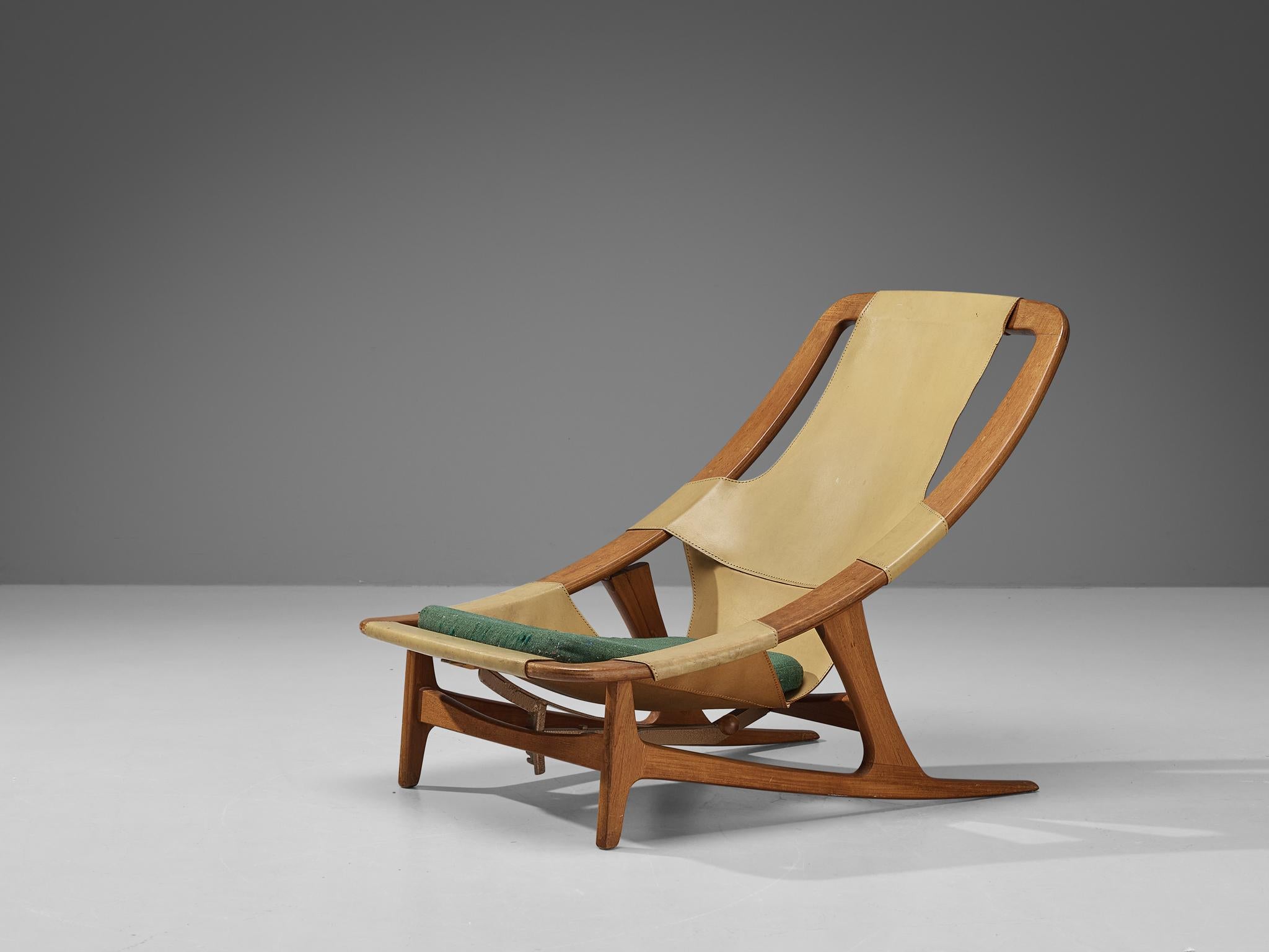 Arne F. Tidemand for Norcraft, 'Holmenkollen' lounge chair, leather, teak, Norway, 1959

This easy chair is designed by Norwegian designer Arne F. Tidemand Ruud and produced by Norwegian company Norcraft. This chair is very dynamic due its design