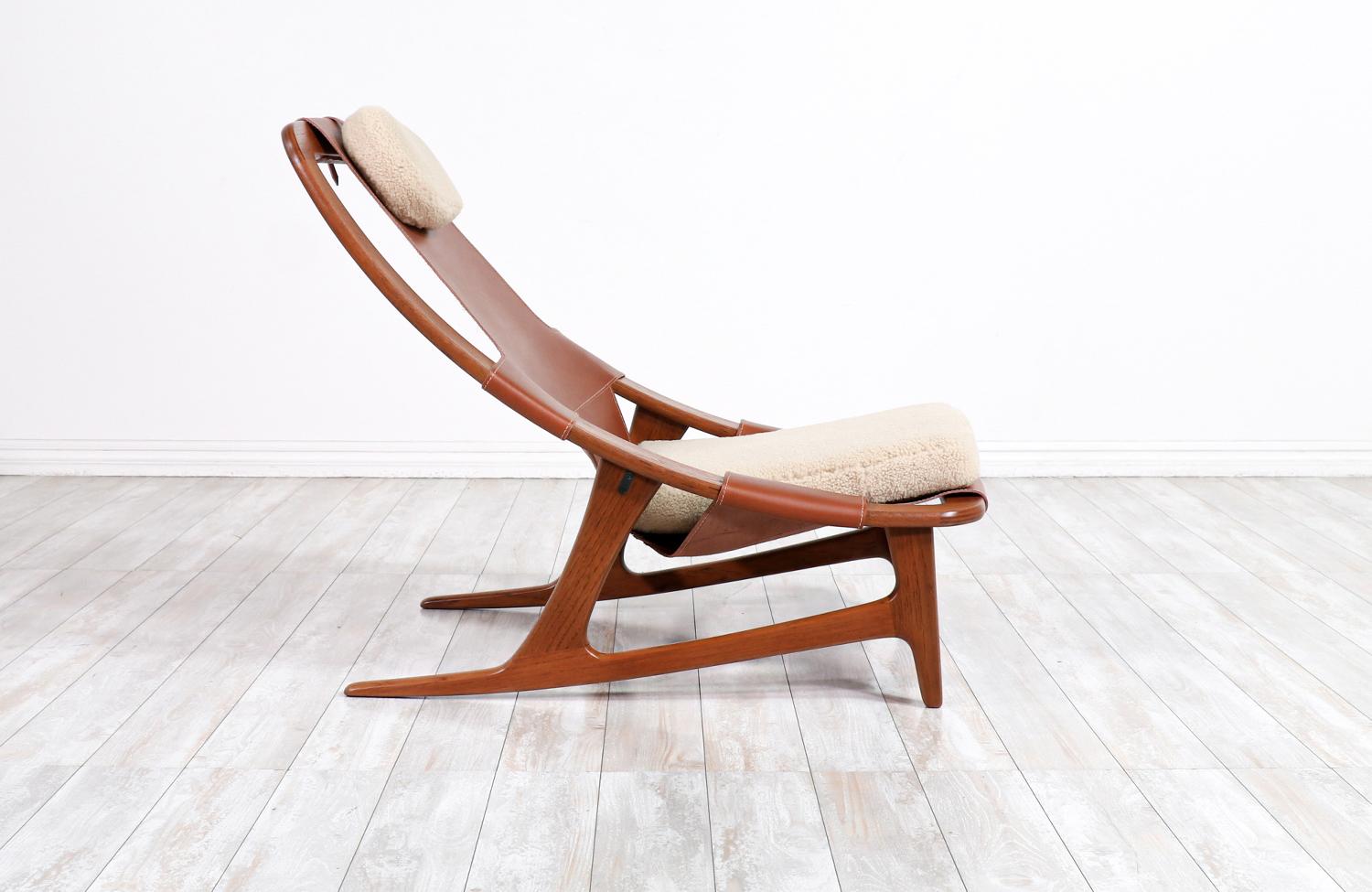 Arne Tidemand Ruud cognac leather & shirley sheep skin lounge chair.
