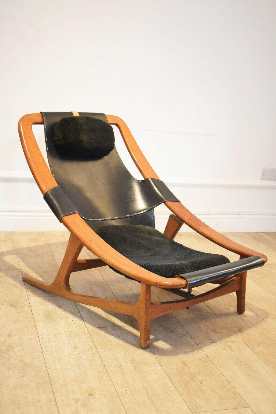 Arne F. Tidemand Ruud for ISA, lounge chair 'Holmenkollen,' teak and light black leather, Italy, 1959. £8,900.00.

This easy chair is designed by Norwegian designer Arne F. Tidemand Ruud. 

This chair is very dynamic due it's design and